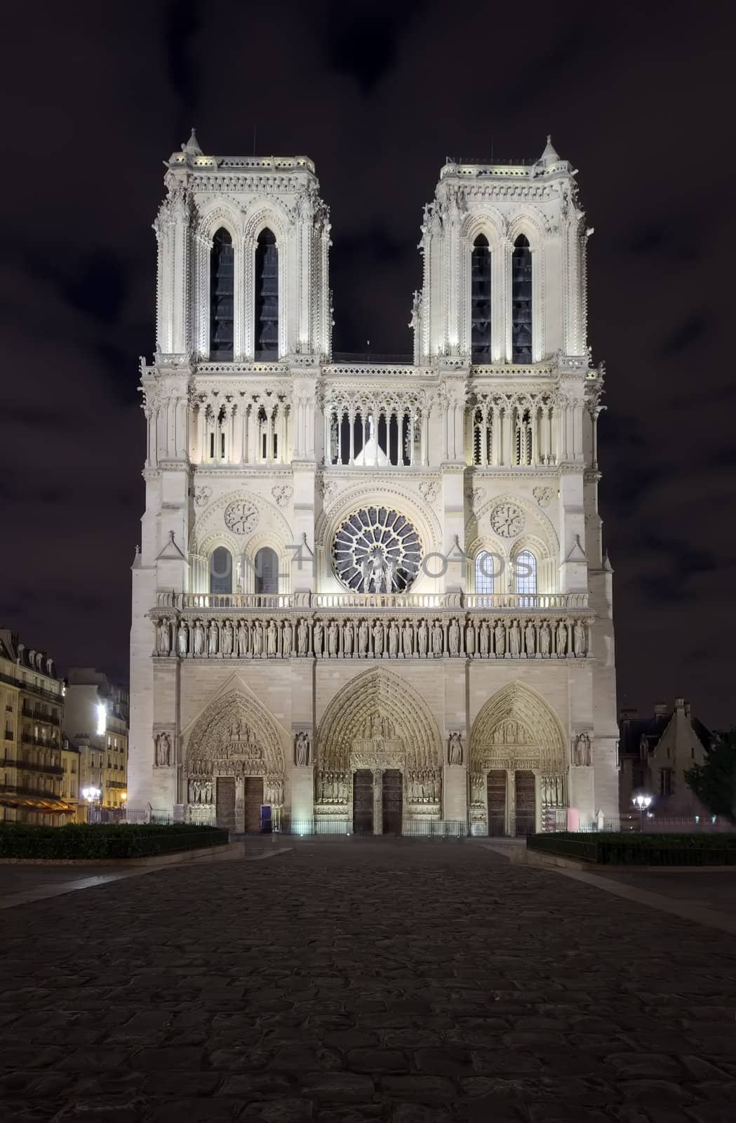night scene of Notre Dame cathedral, Paris France