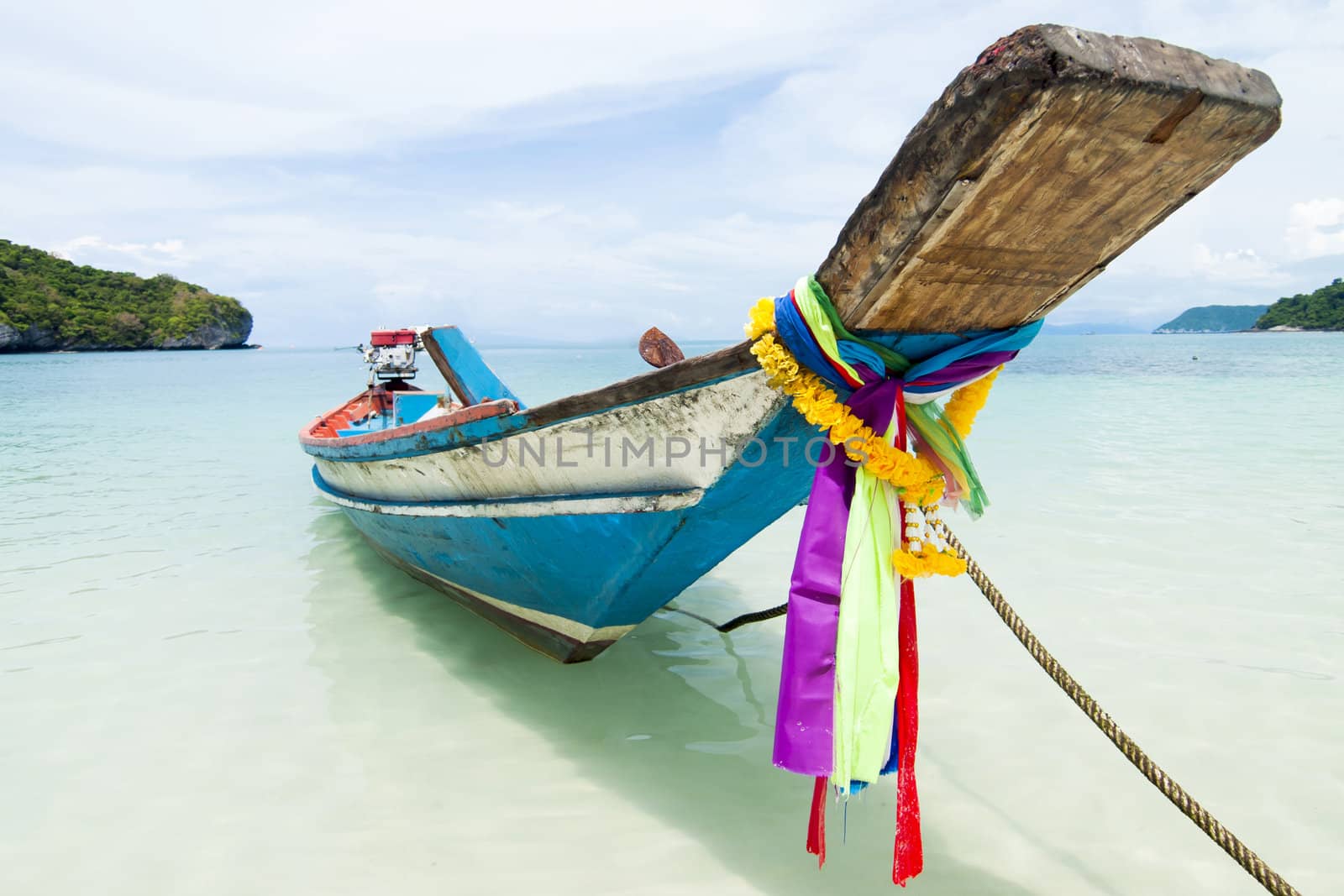 long tail boat sit on the beach, Samui island, Thailand by jakgree