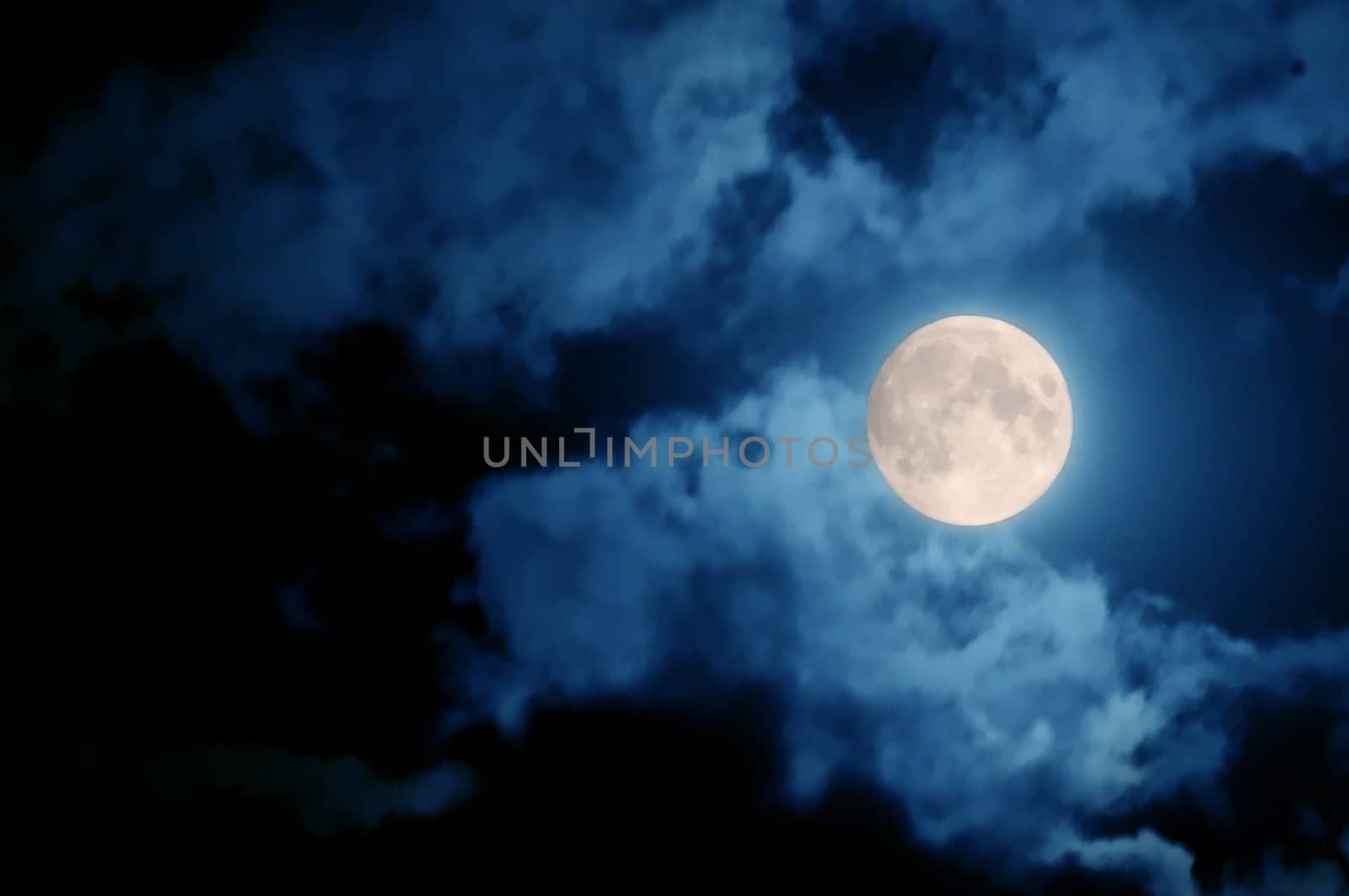 full moon over dark sky with.
