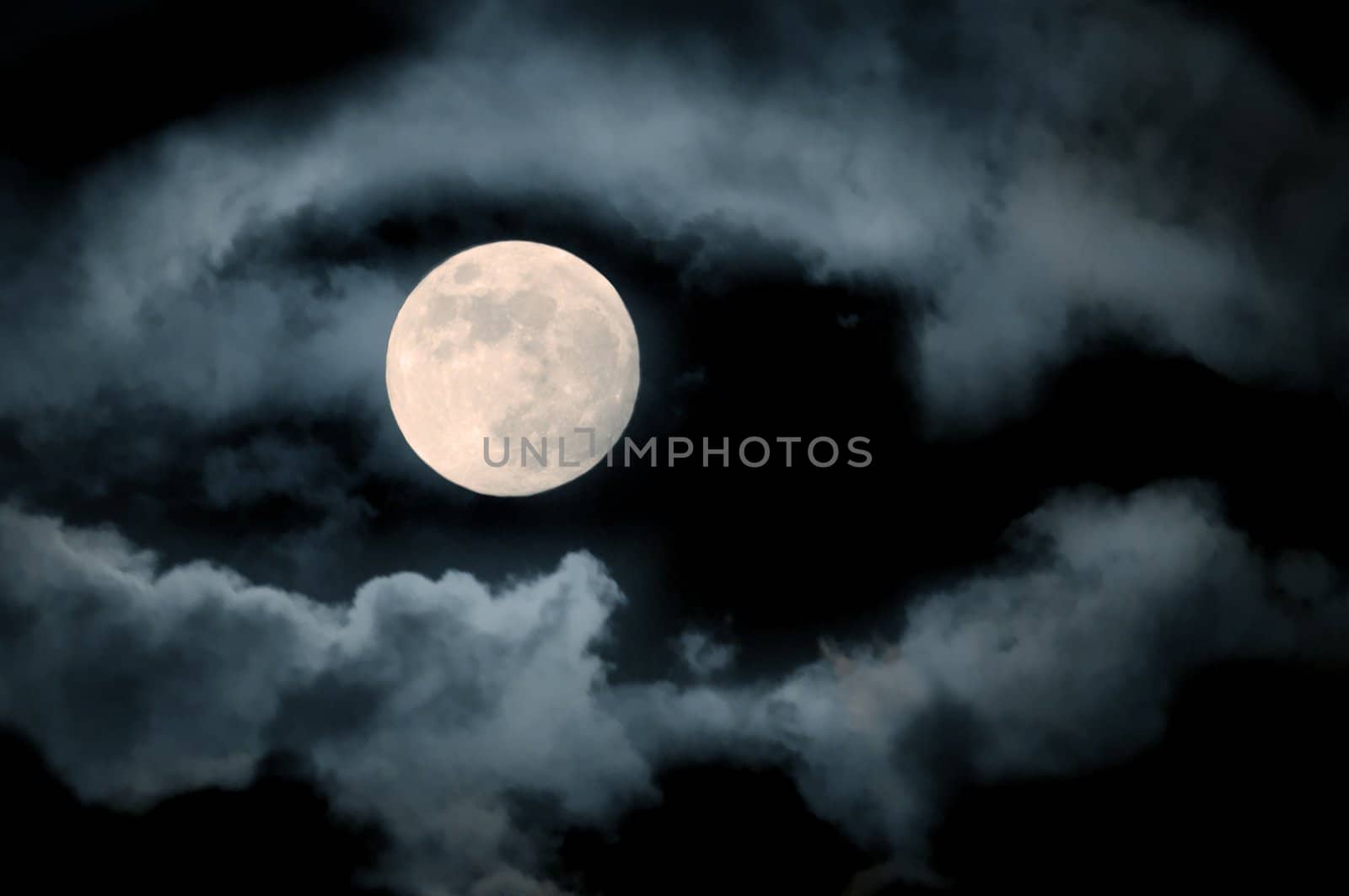 full moon over dark sky with.