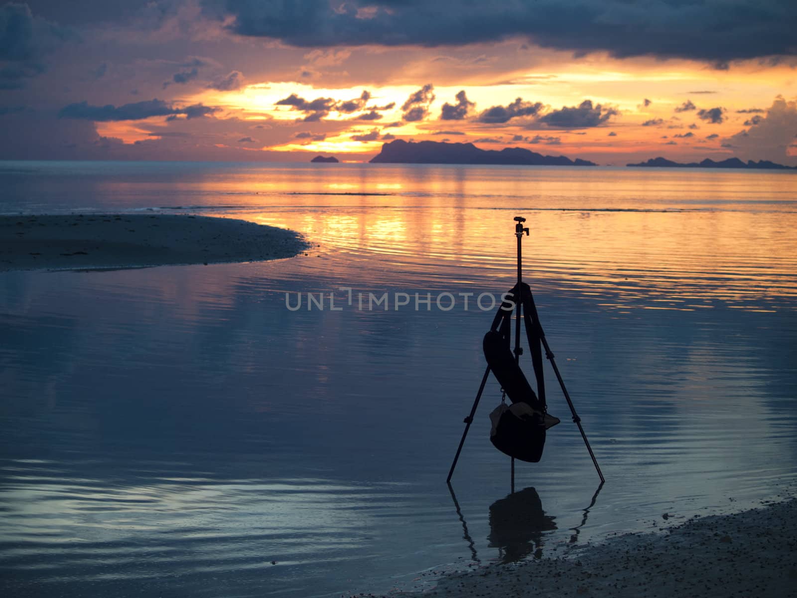 Tripod Silhouette At Sunrise by jakgree