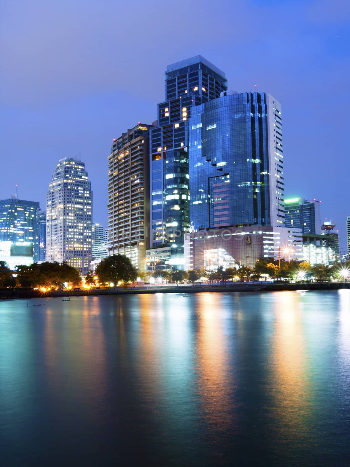 Bangkok city downtown at night with reflection of skyline, Bangk by jakgree