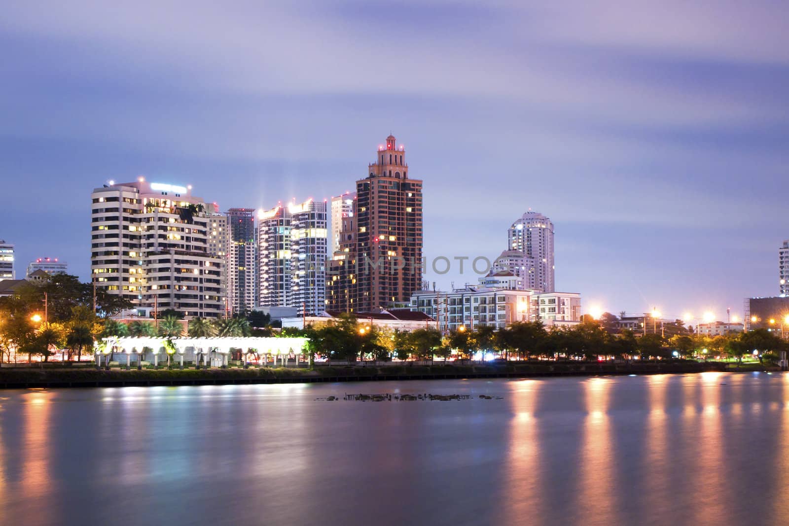 Bangkok city downtown at night with reflection of skyline, Bangkok,Thailand