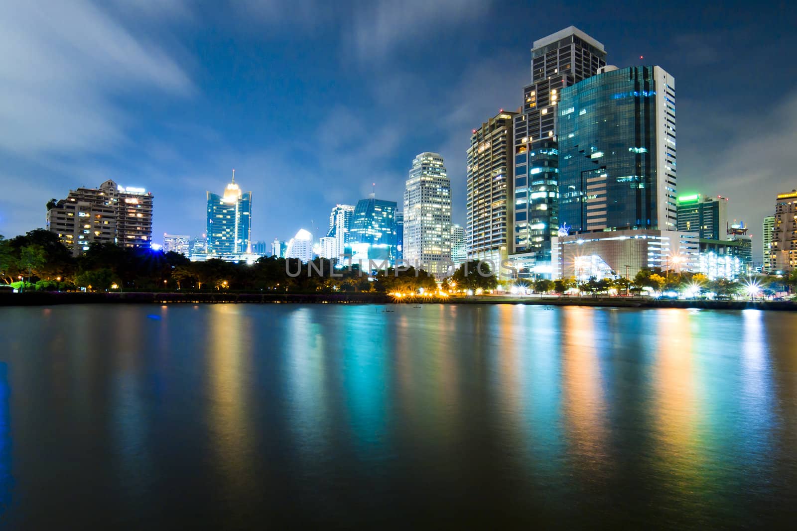 Bangkok city downtown at night with reflection of skyline, Bangkok,Thailand