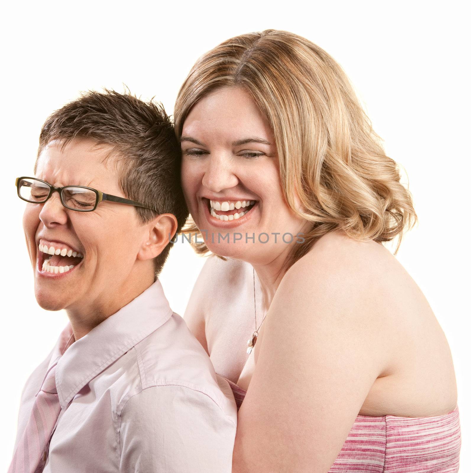 Two European friends laughing together over white background