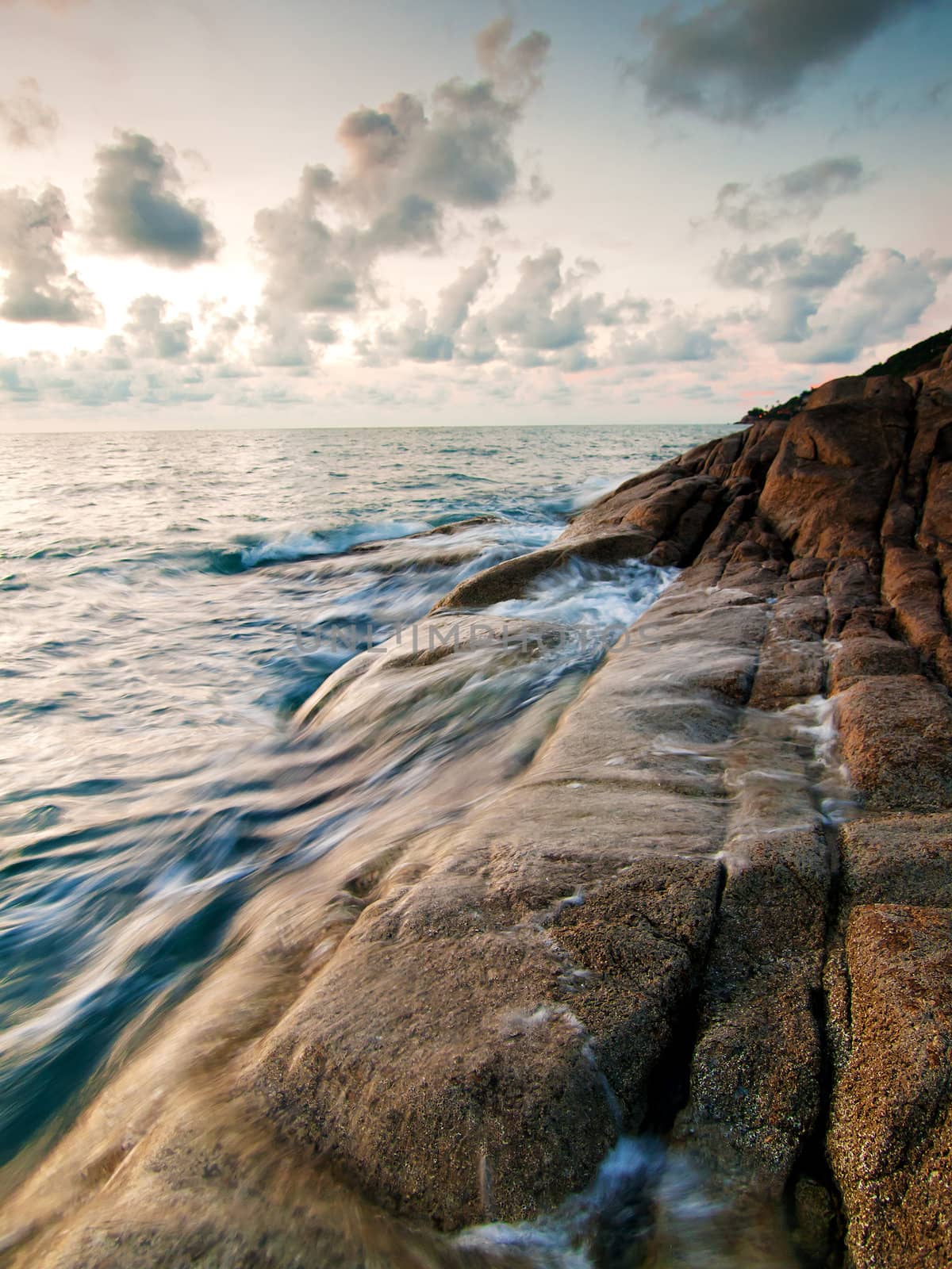 Beautiful seascape. Sea and rock at the sunset by jakgree