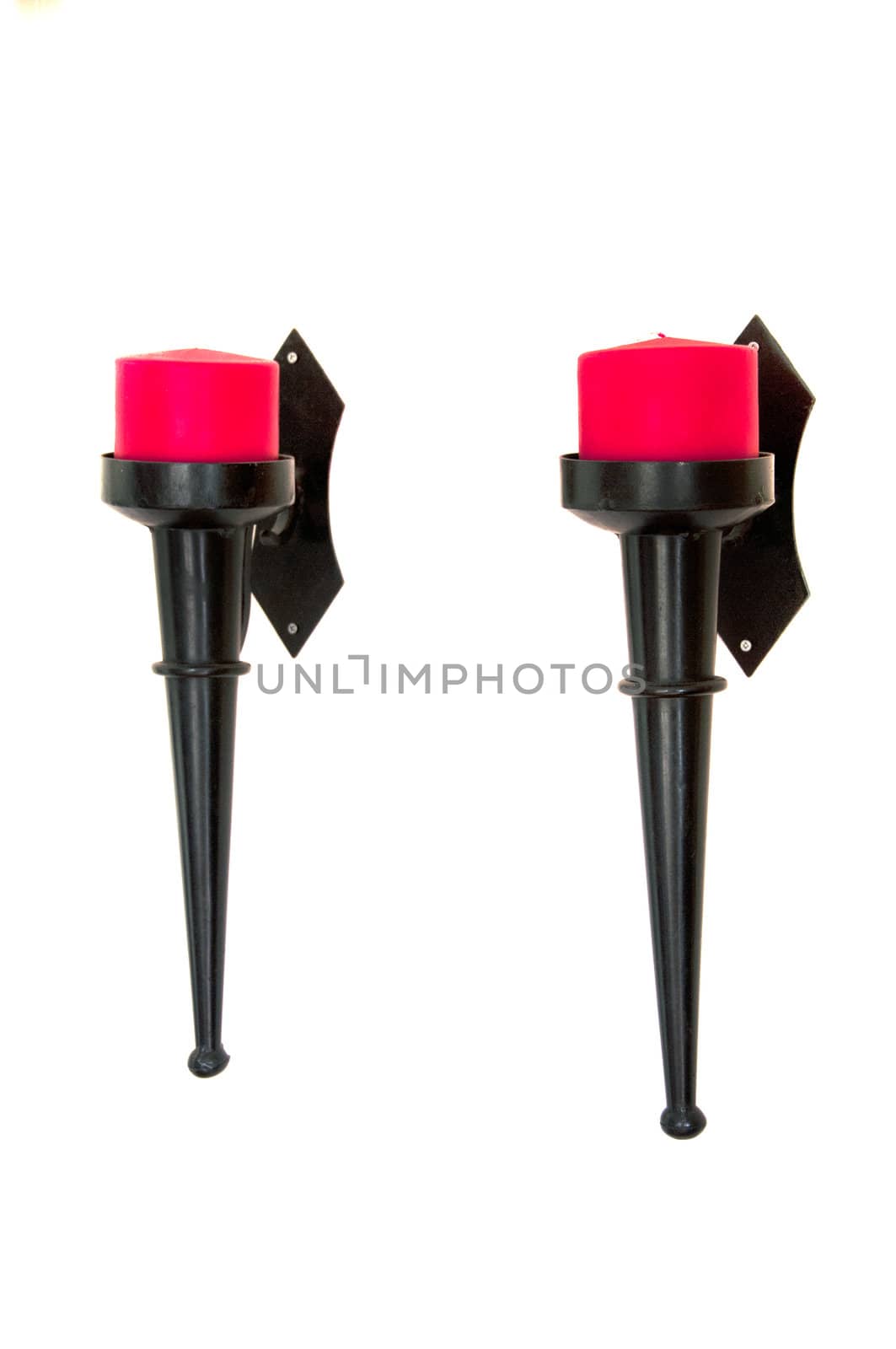 two red candle lights  on black ornament