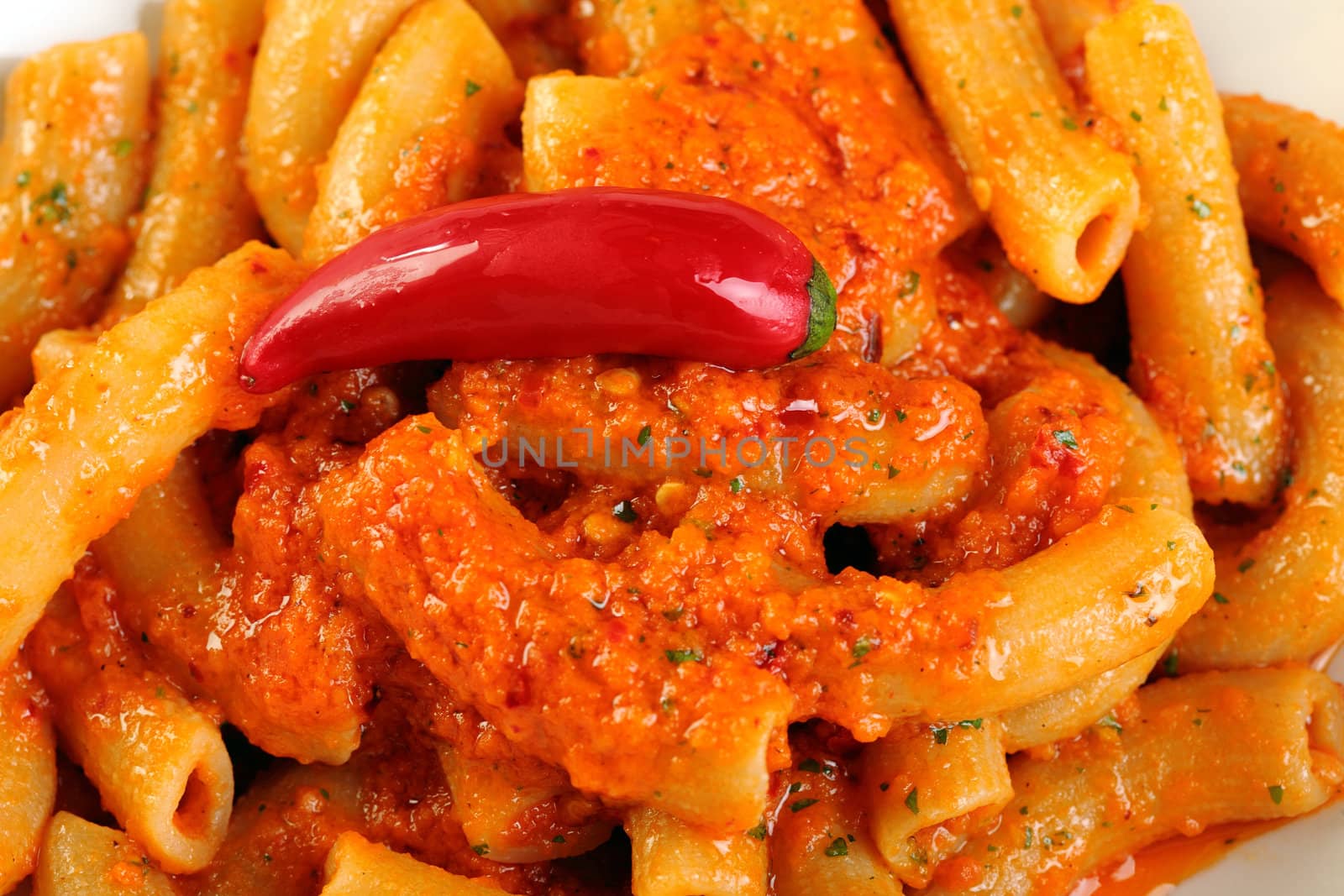 Pasta arrabiata with tomato sauce and hot chilli