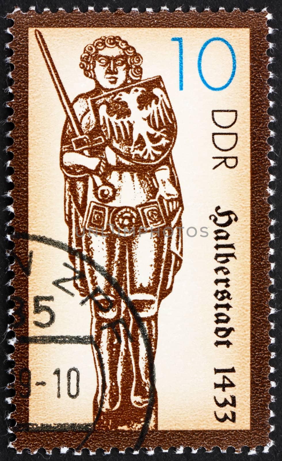 GDR - CIRCA 1989: a stamp printed in GDR shows Statue of Roland, Medieval Hero, Halberstadt, 1445, circa 1989