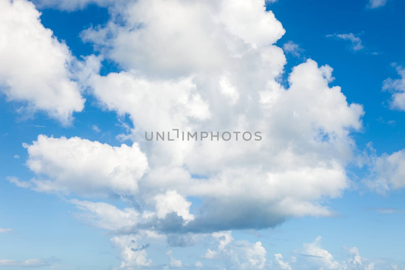 Beautiful Cloudscape with Blue Sky and White Fluffy Cumulus Clouds Background