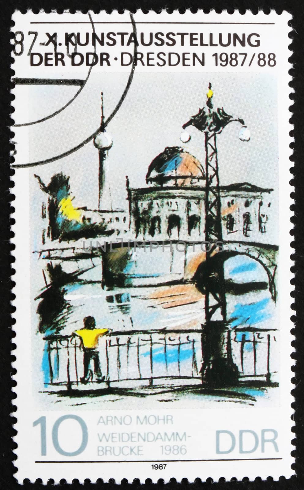 GDR - CIRCA 1987: a stamp printed in GDR shows Painting of Weidendamm Bridge by Arno Mohr, Berlin 1986, circa 1987