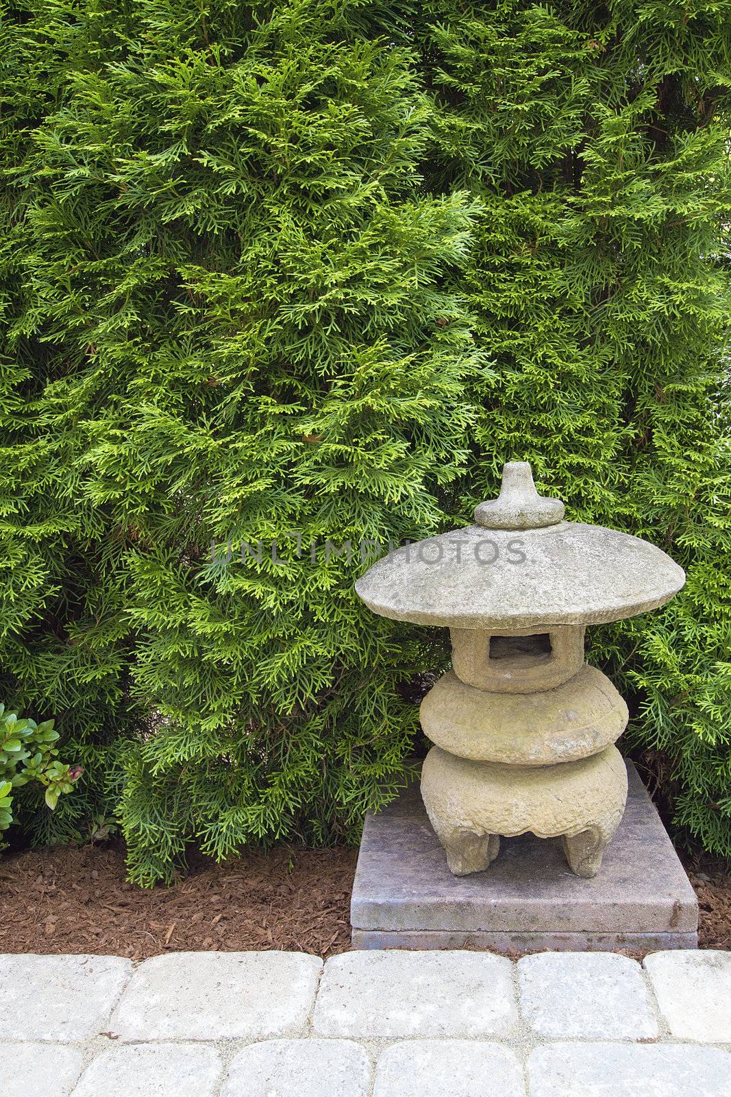 Japanese Stone Pagoda in Backyard Garden Paver Patio