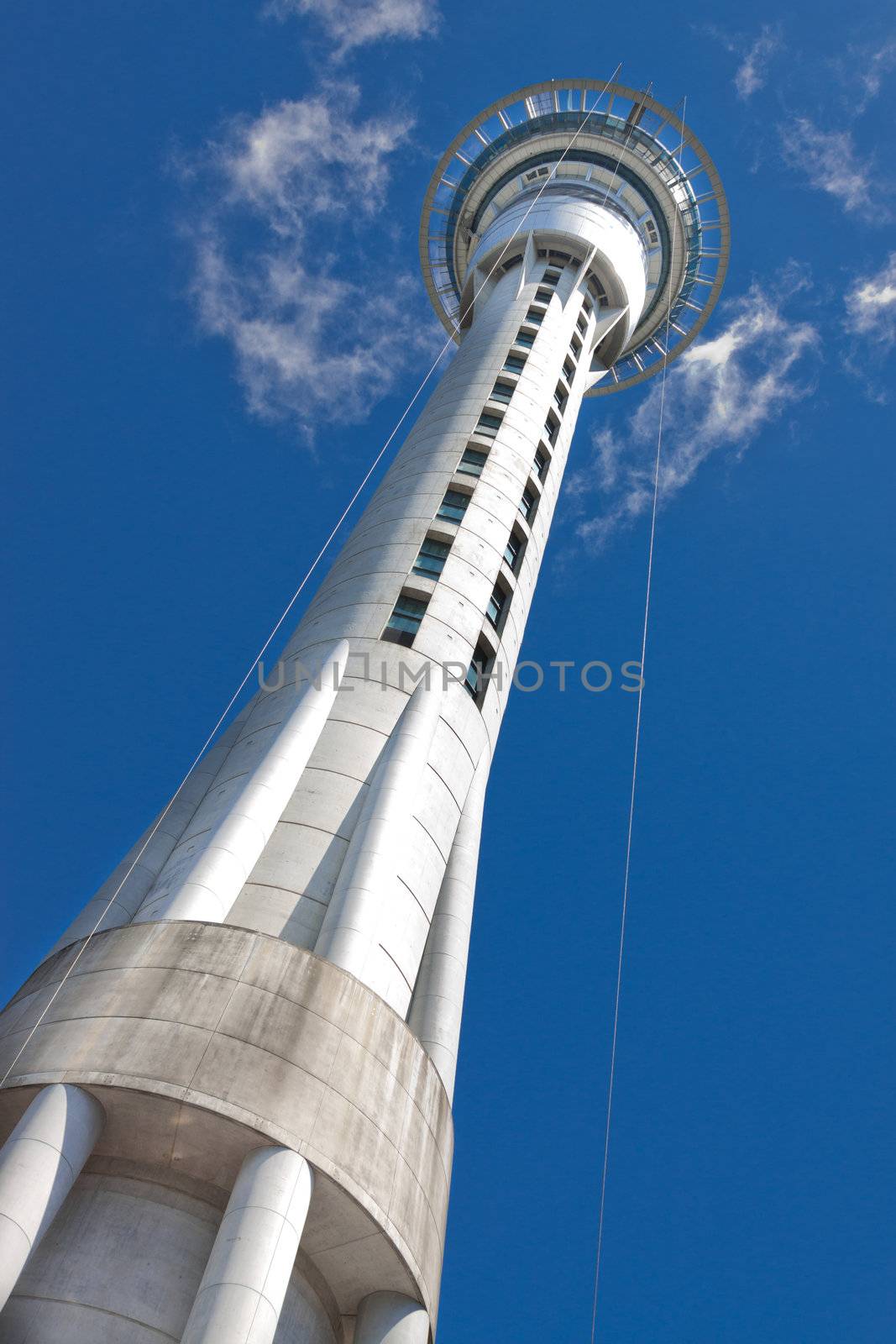Auckland sky tower, base view. with blue sky. The tallest fress-standing structure in the southern hemisphere.