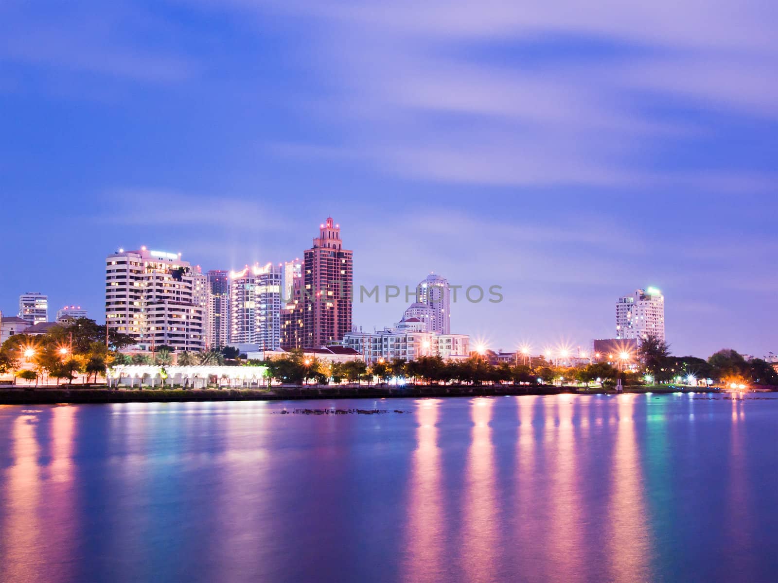 Bangkok city downtown at night with reflection of skyline, Bangk by jakgree