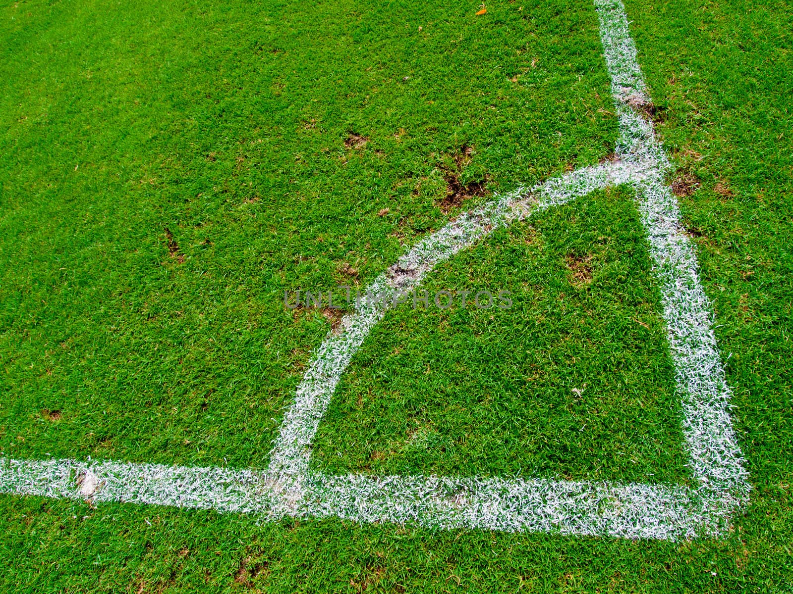 Green soccer field , Corner Kick from top view by jakgree