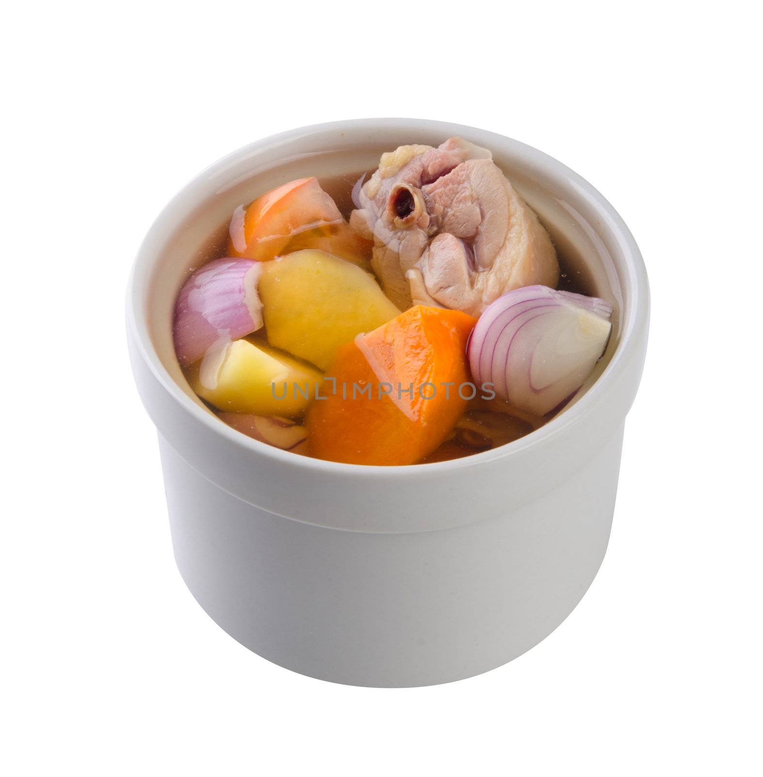 Chicken and herb soup in pot, Chinese food style.