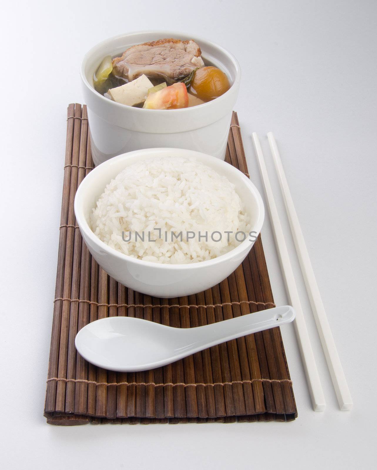 Chicken and herb soup in pot, Chinese food style.