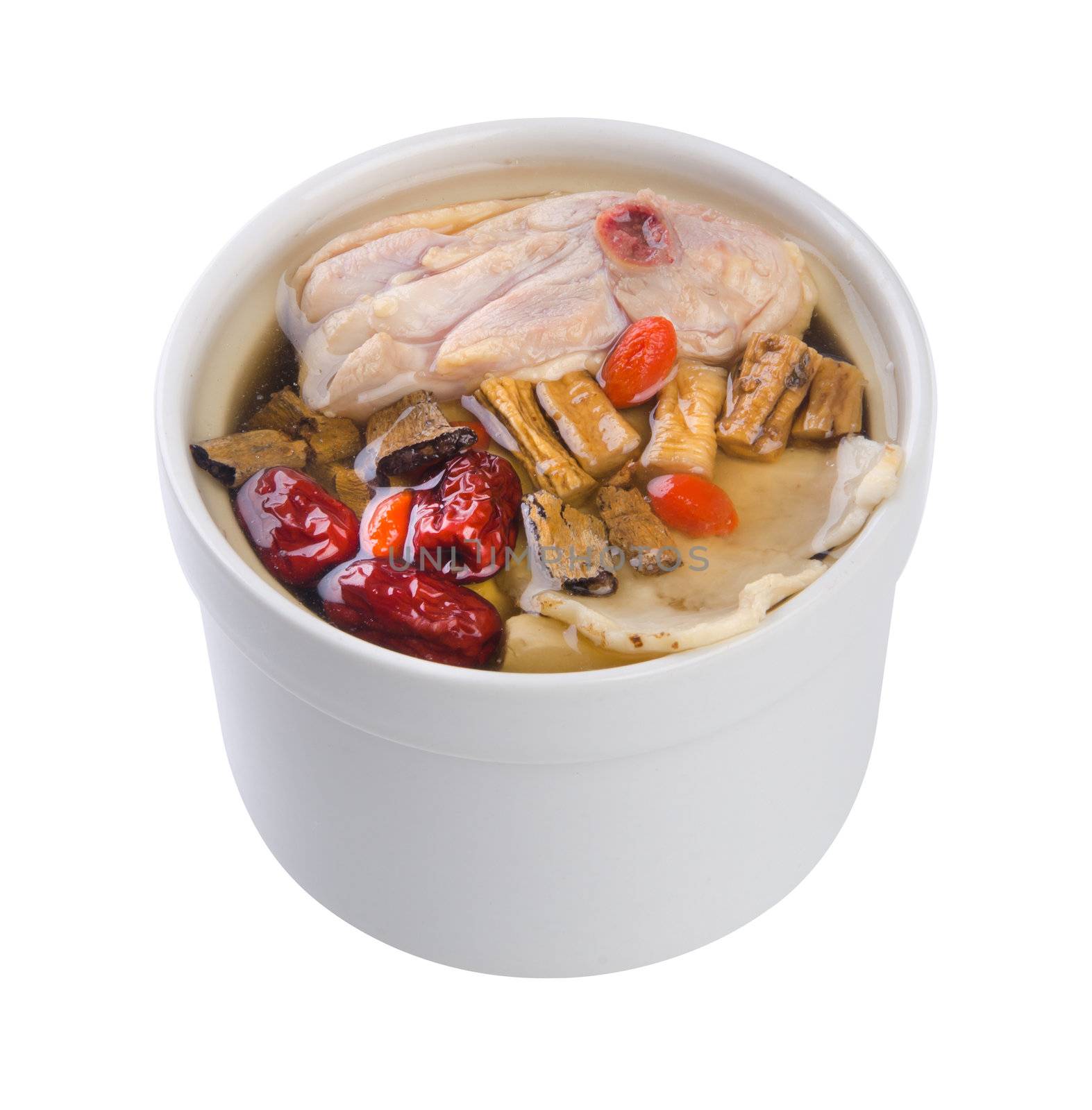 Chicken and herb soup in pot, Chinese food style.