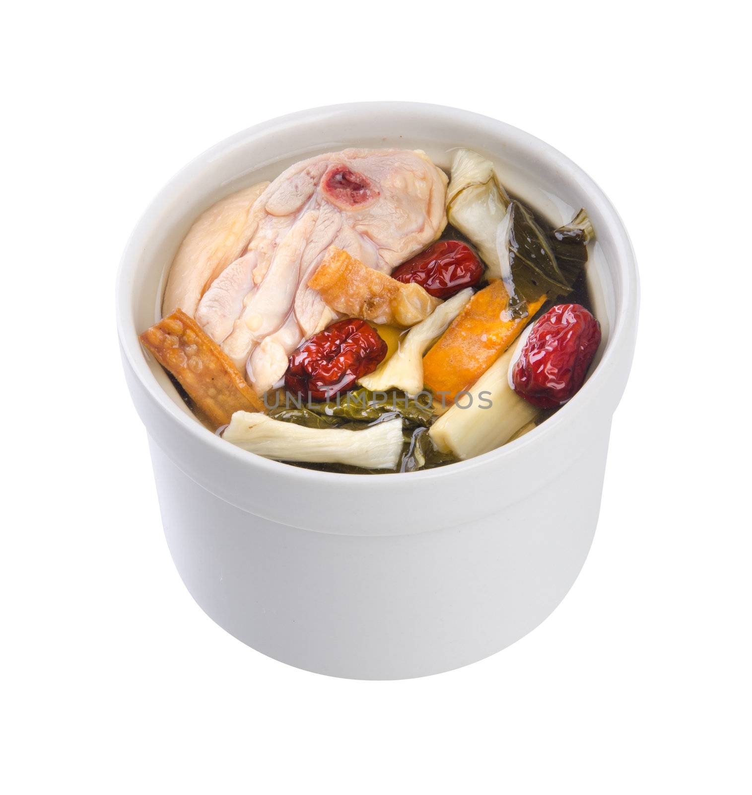 Chicken and herb soup in pot, Chinese food style.