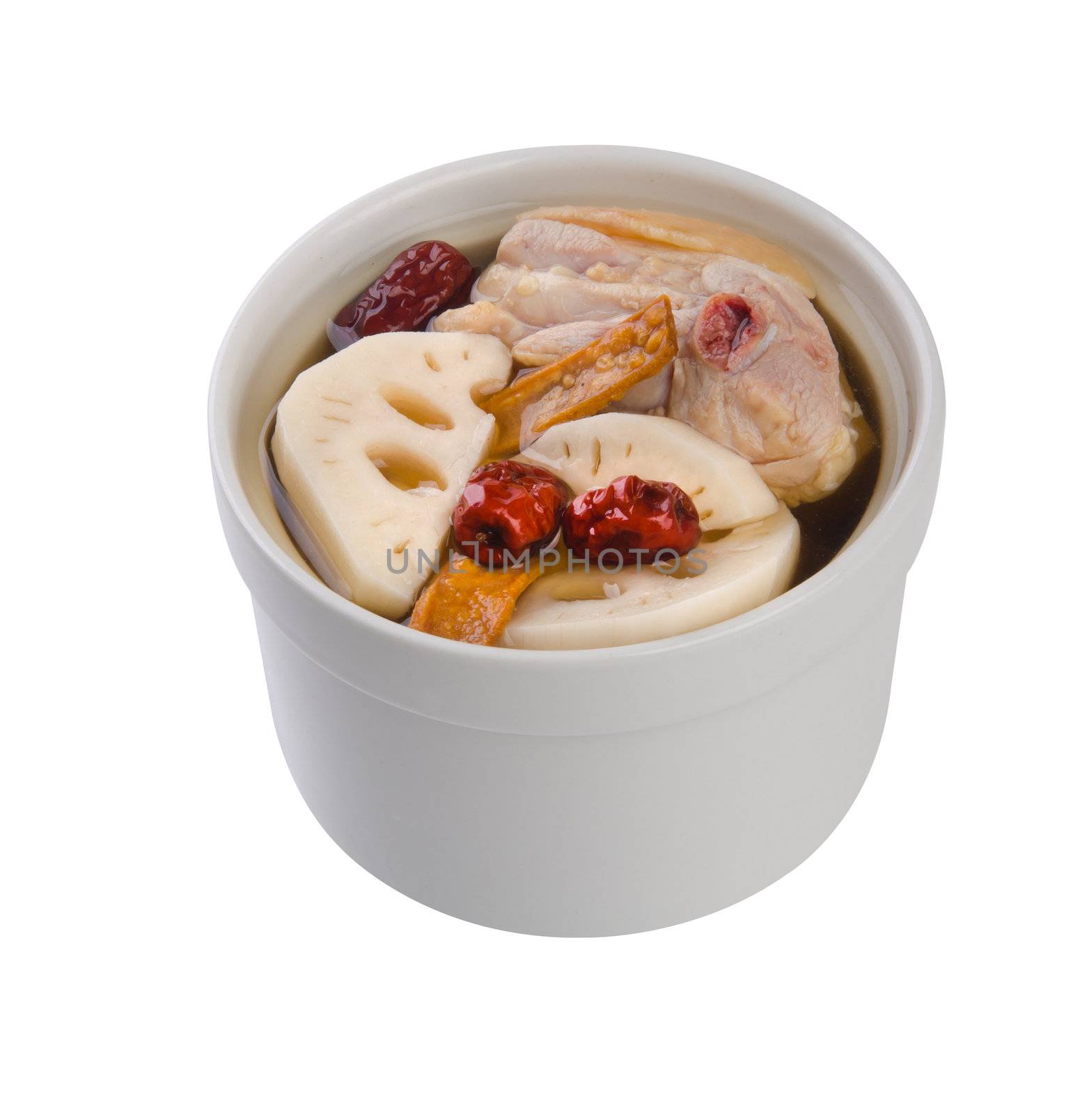 Chicken and herb soup in pot, Chinese food style.