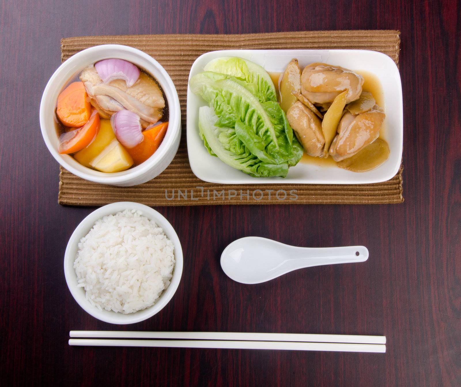 Chicken and herb soup in pot, Chinese food style. by heinteh