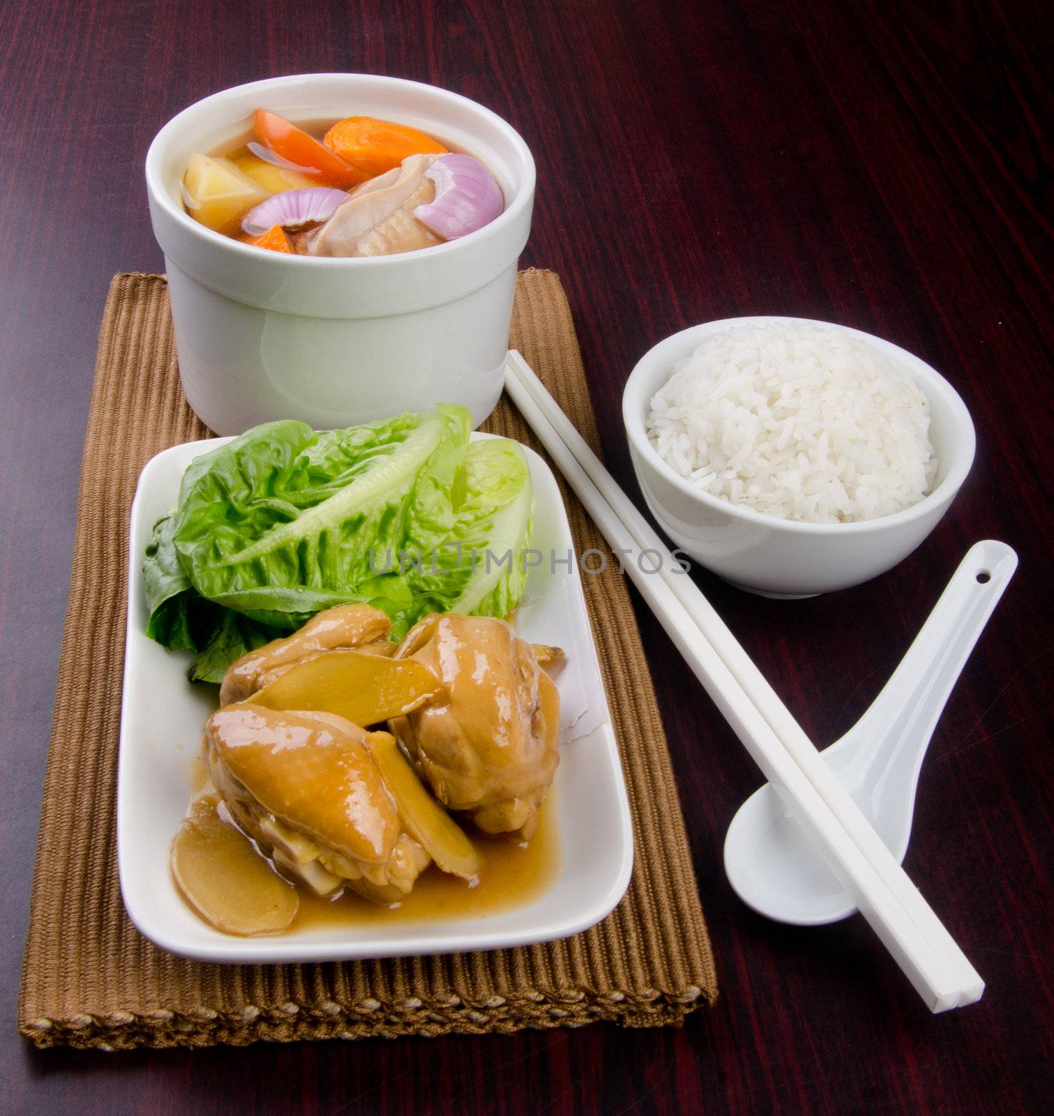 Chicken and herb soup in pot, Chinese food style.