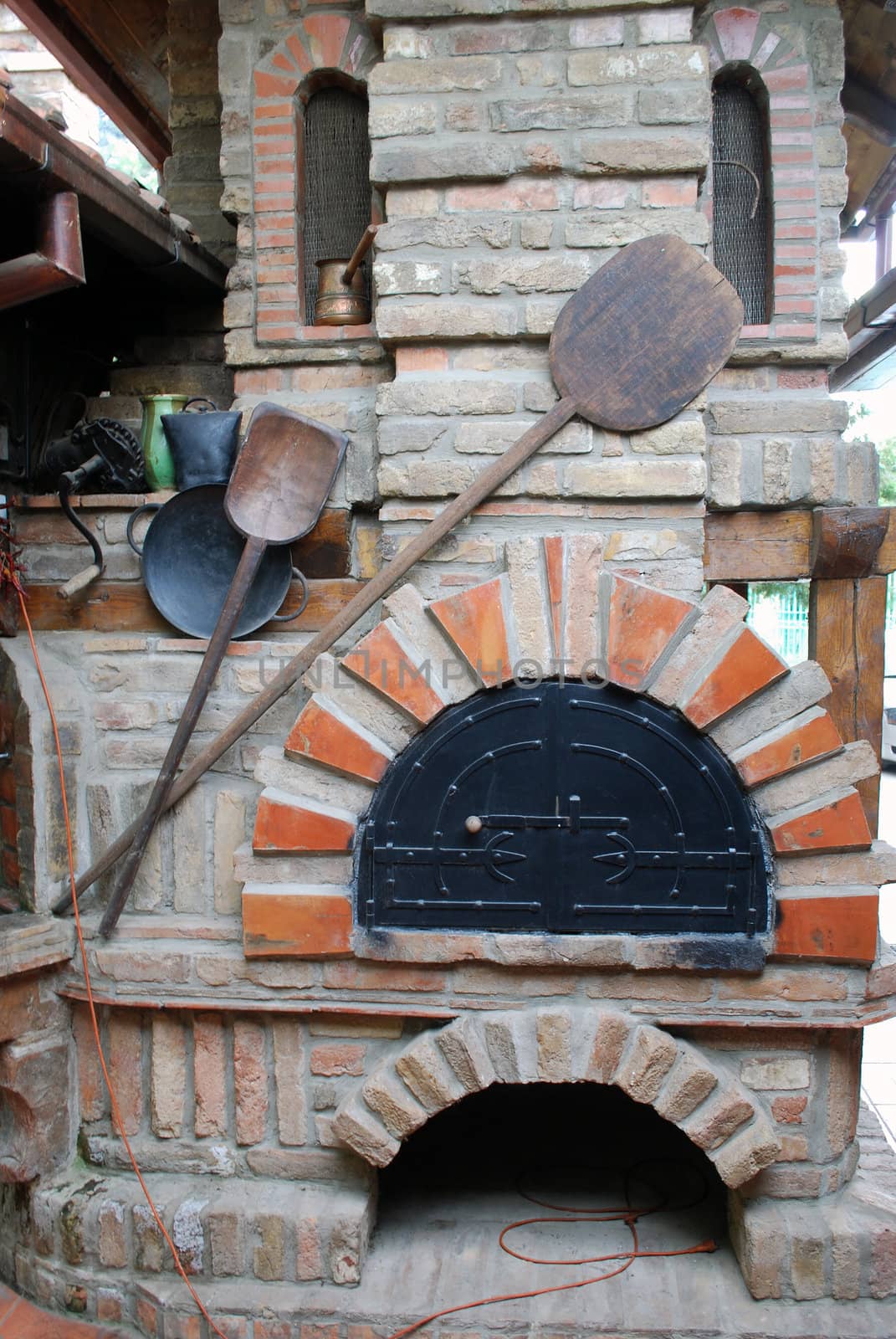 Old bakery stove and peel