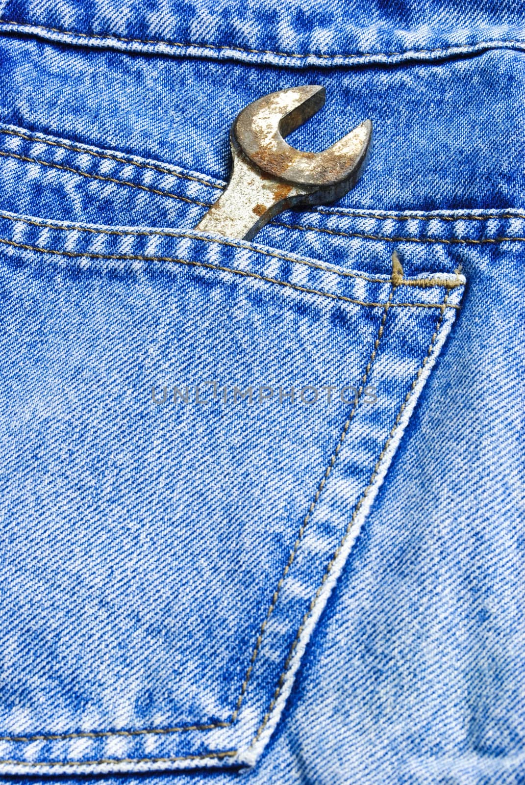This is wrench in pocket of fabric jeans