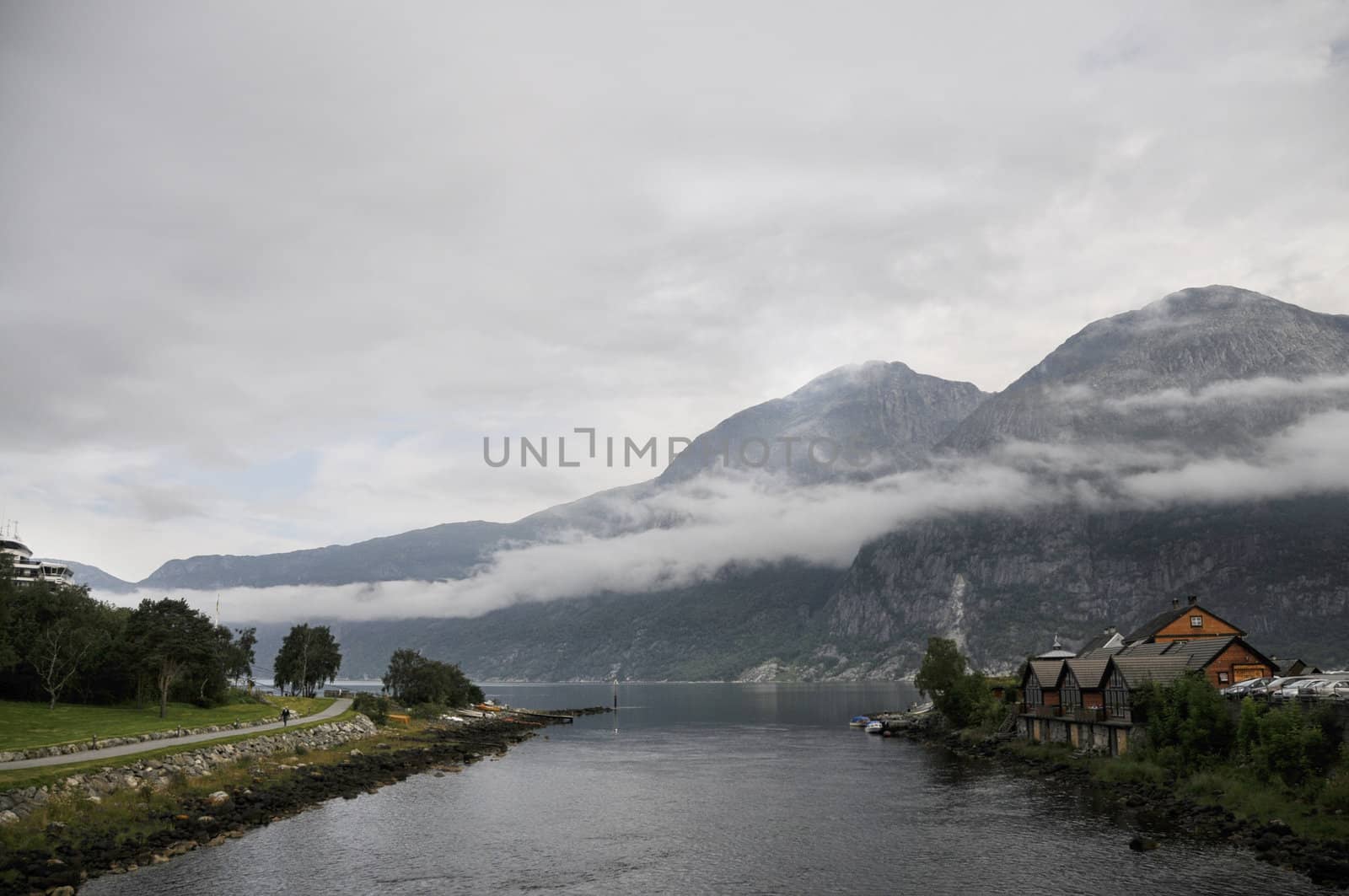 fog above the lake  of the quiet Norwegian bay