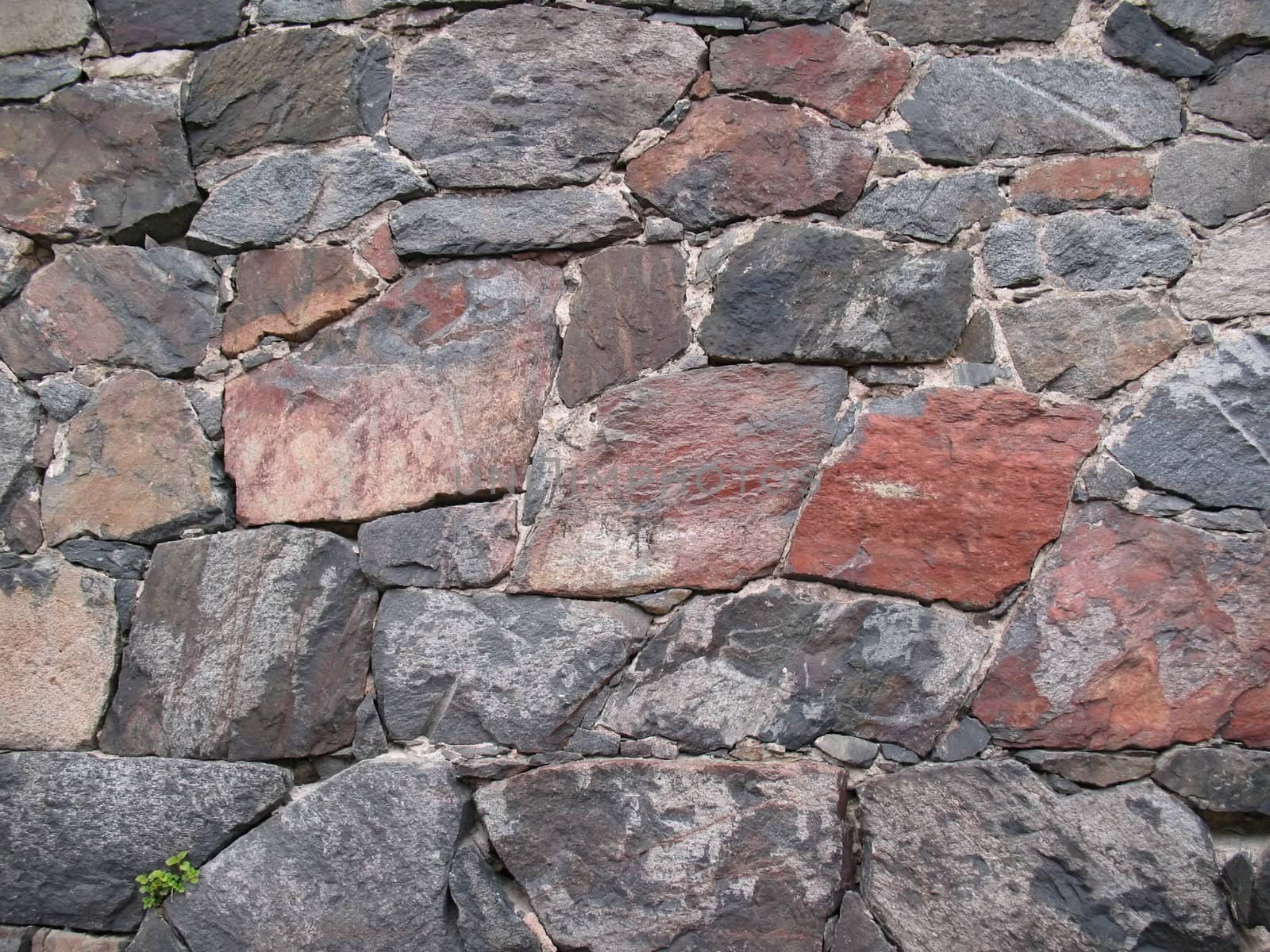 Texture of stone wall for background by Vitamin