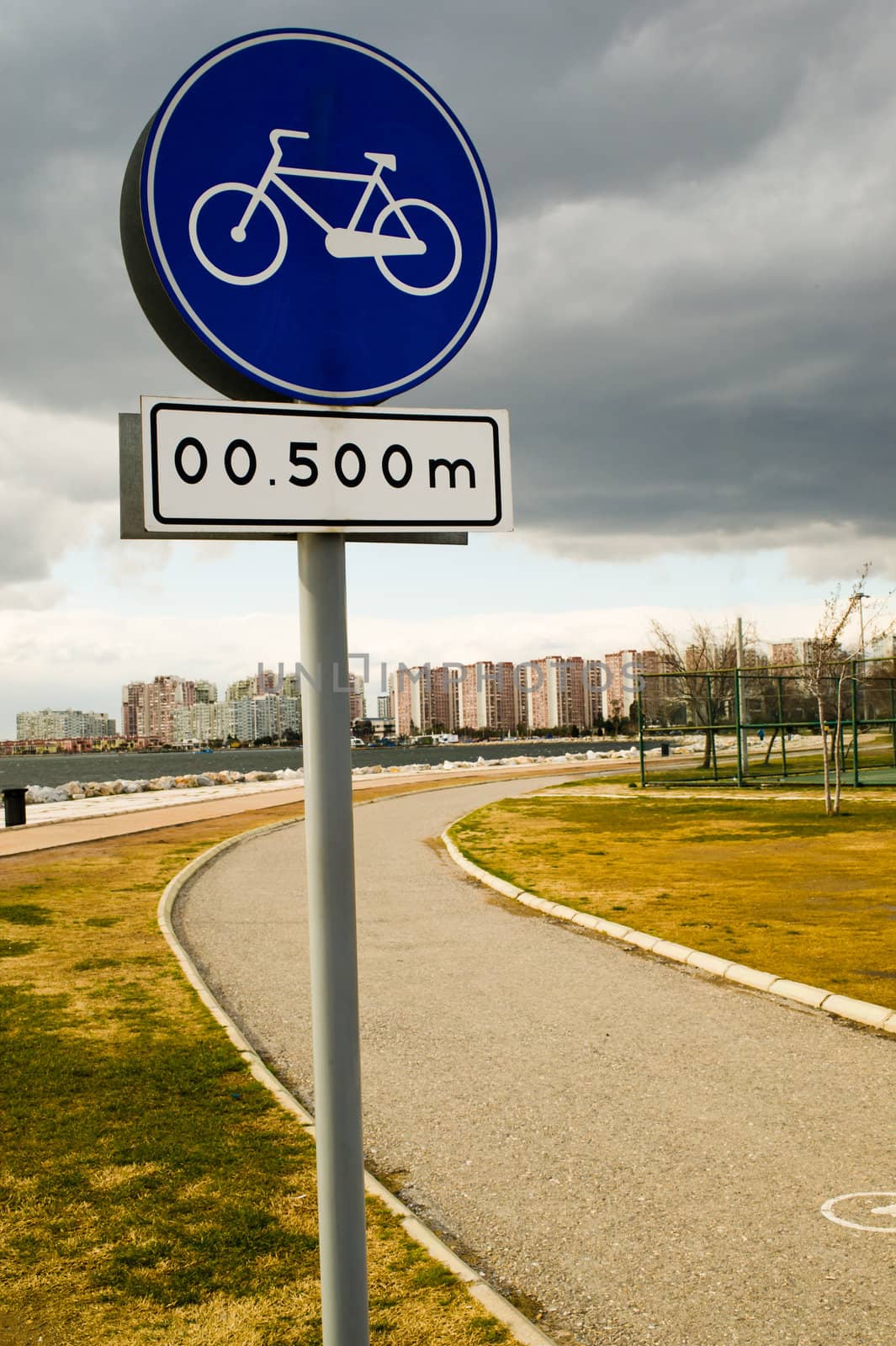 Cycling sign with bike track in the city
