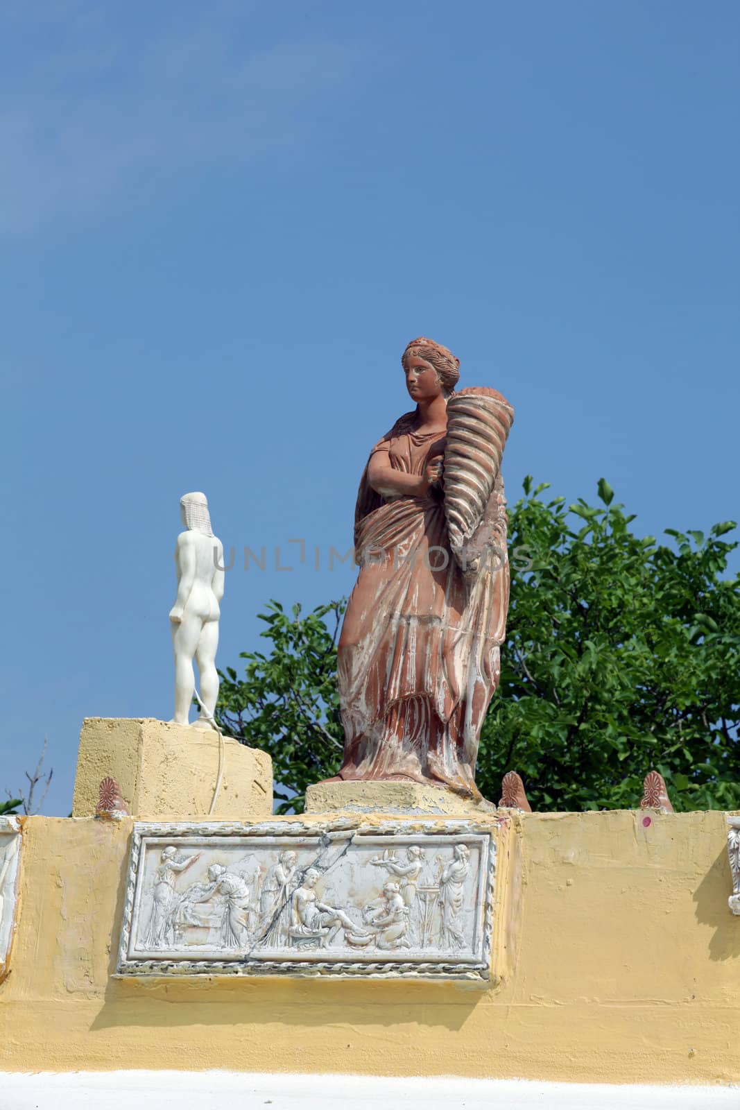 Sculptures on the roof of a house in a traditional Greek village of Zia. Kos Island, Greece