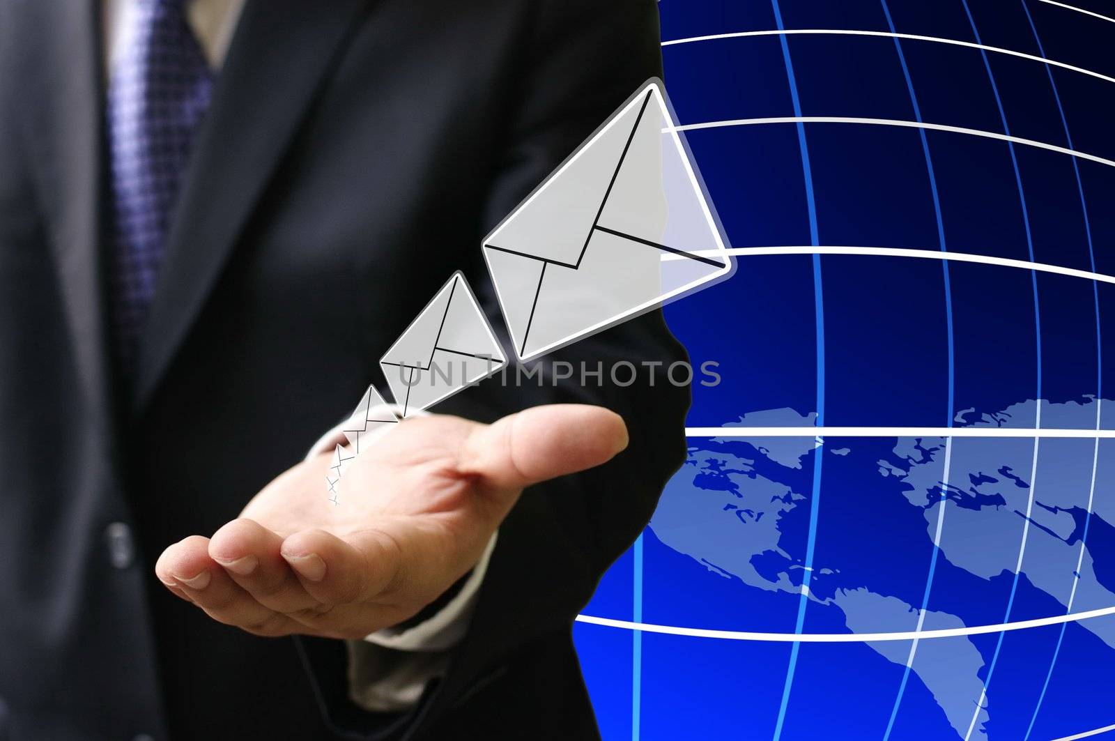 Businessman send email to customer around the world by pixbox77