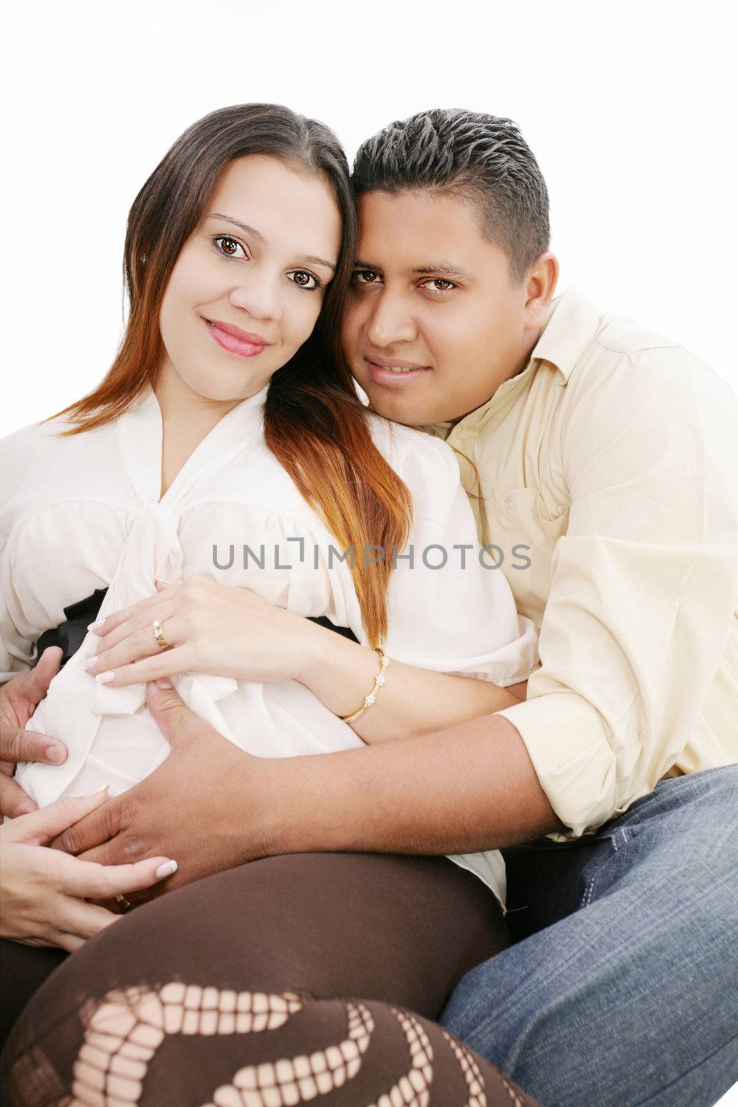Happy pregnant couple expecting their baby over white by dacasdo