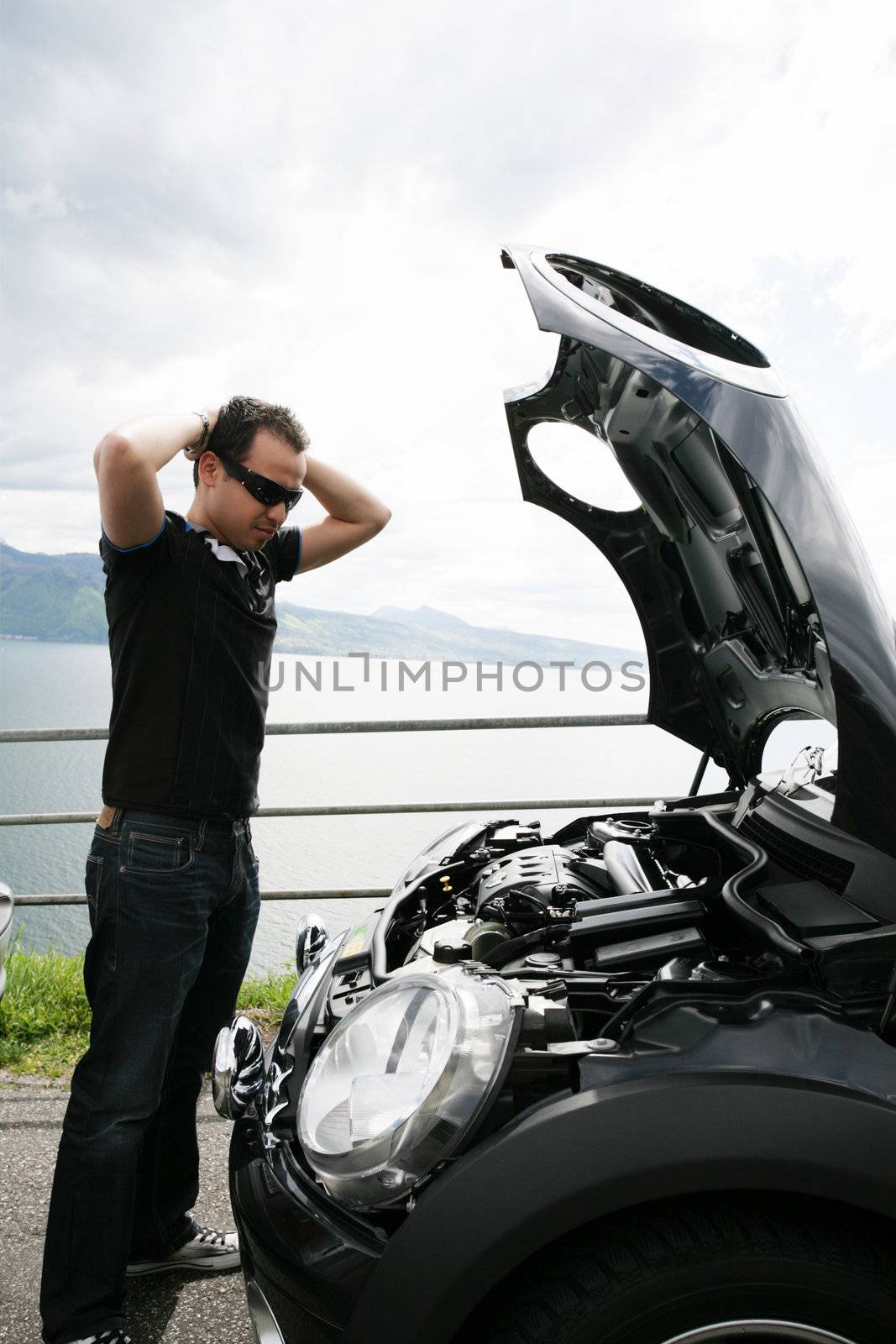 sad man looking at his broken car by dacasdo