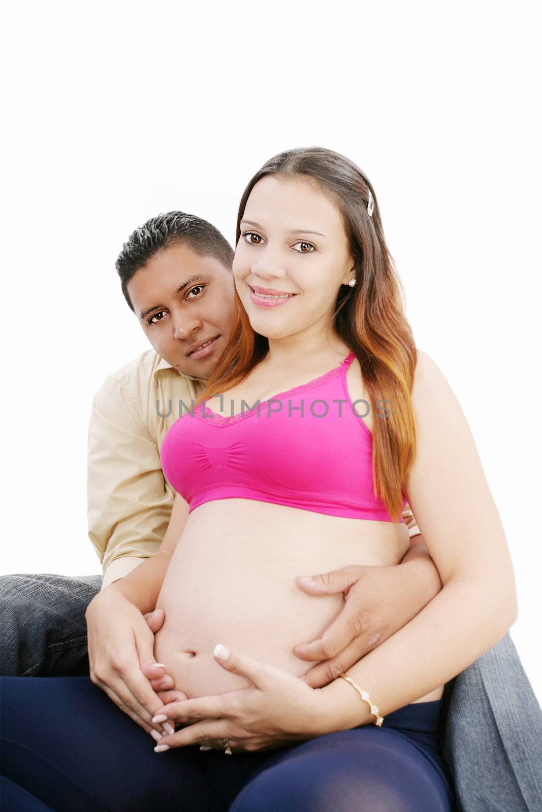 Happy beautiful pregnant woman with his husband by dacasdo