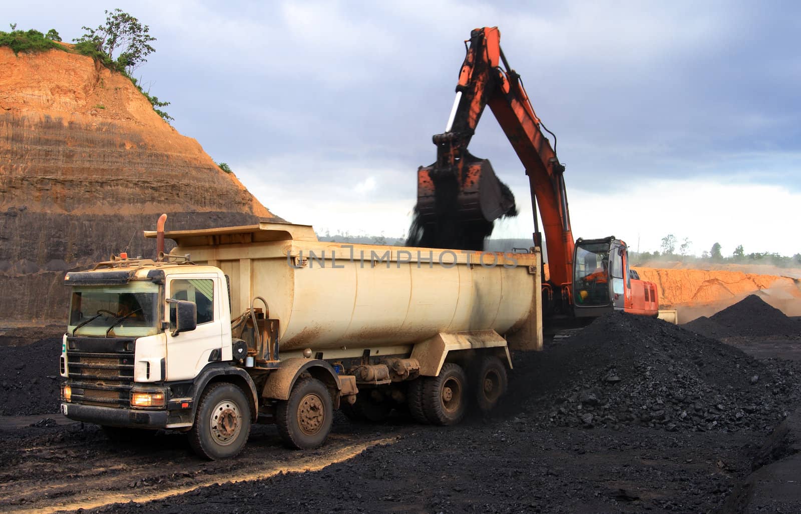 Coal loading dump truck at open mining site