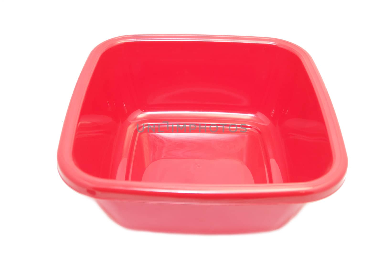 the red kitchen bowl on a white background