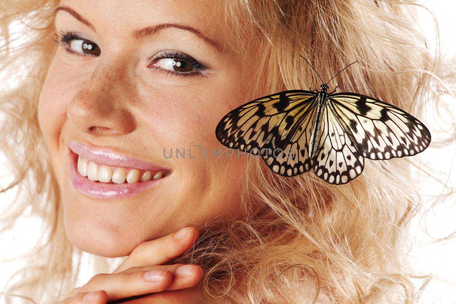 woman and butterfly on white
