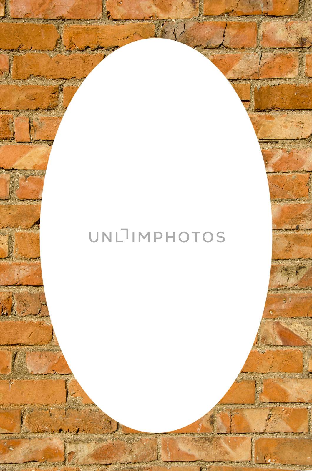 Red brick wall and white oval in center by sauletas