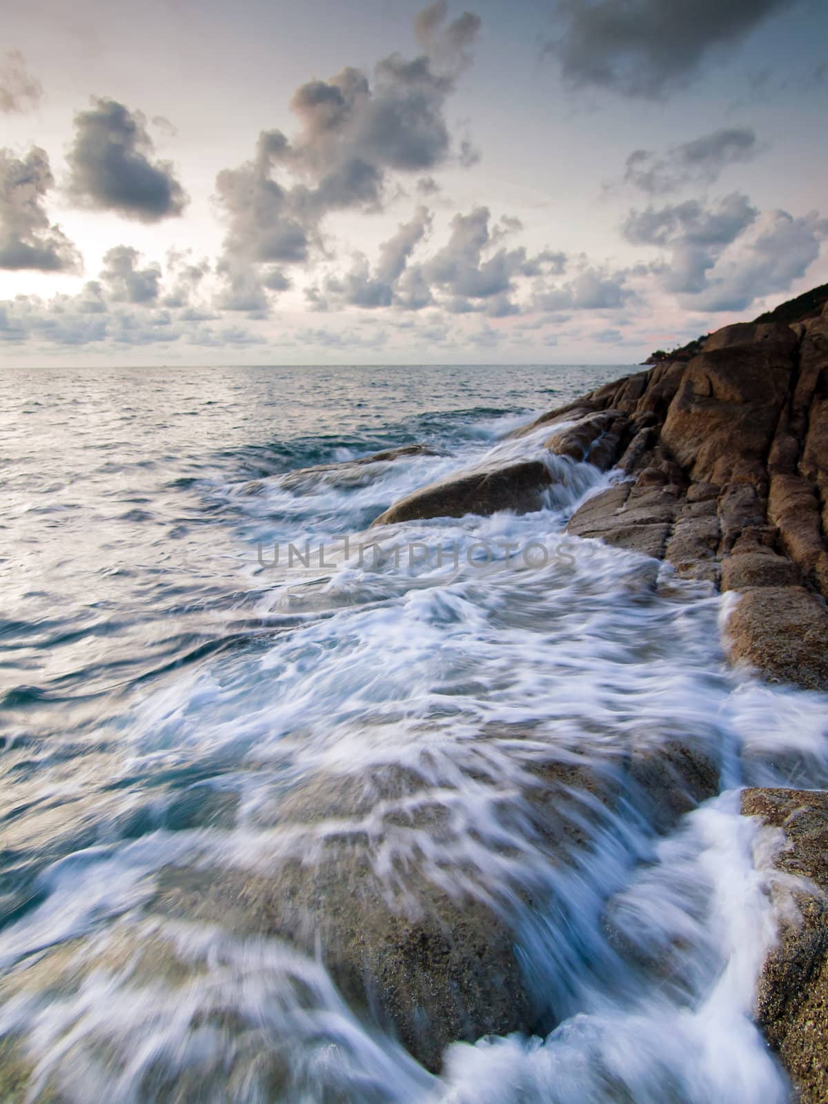 Beautiful seascape. Sea and rock at the sunset by jakgree