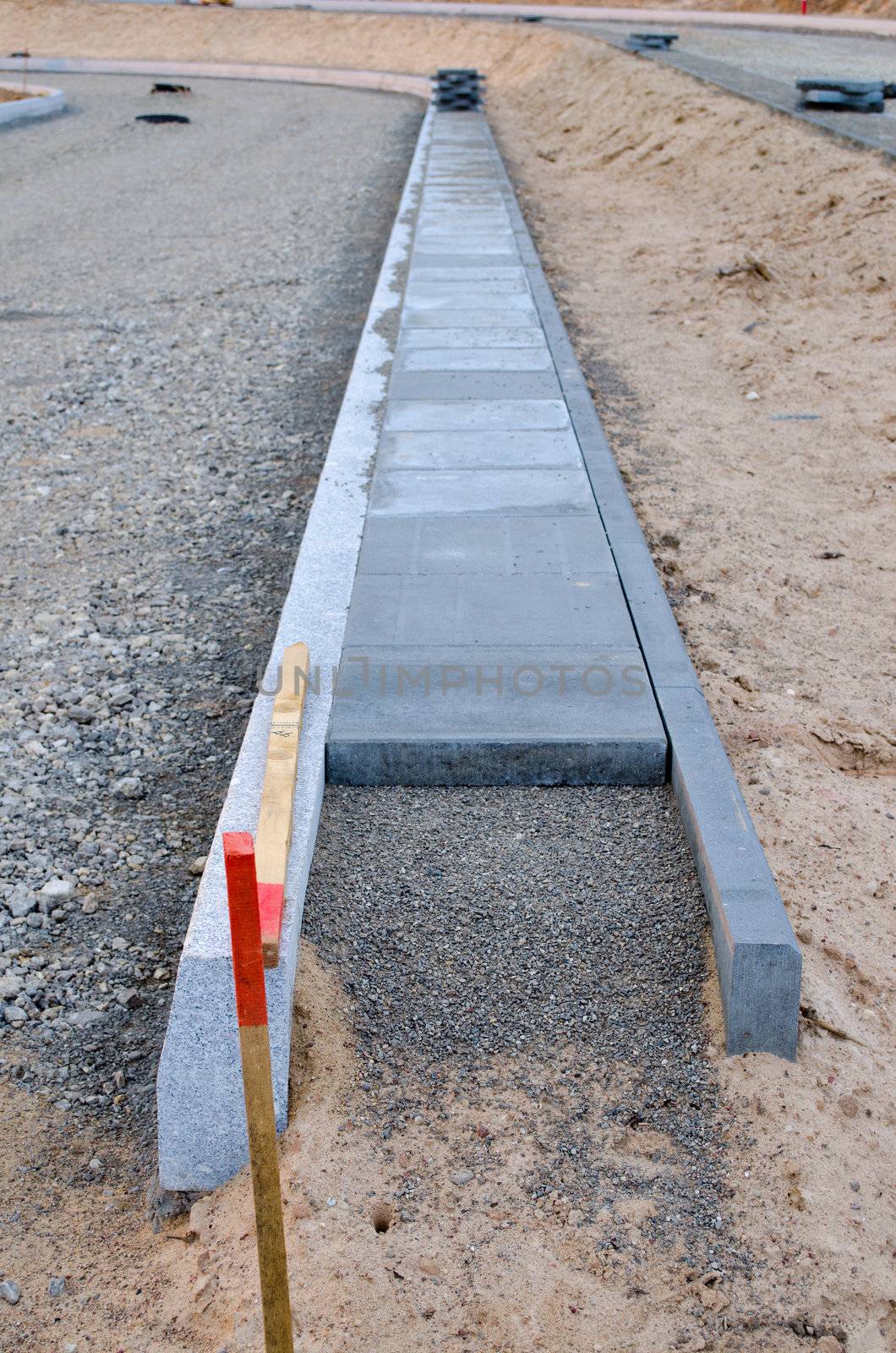 New sidewalk construction and rubble poured by sauletas