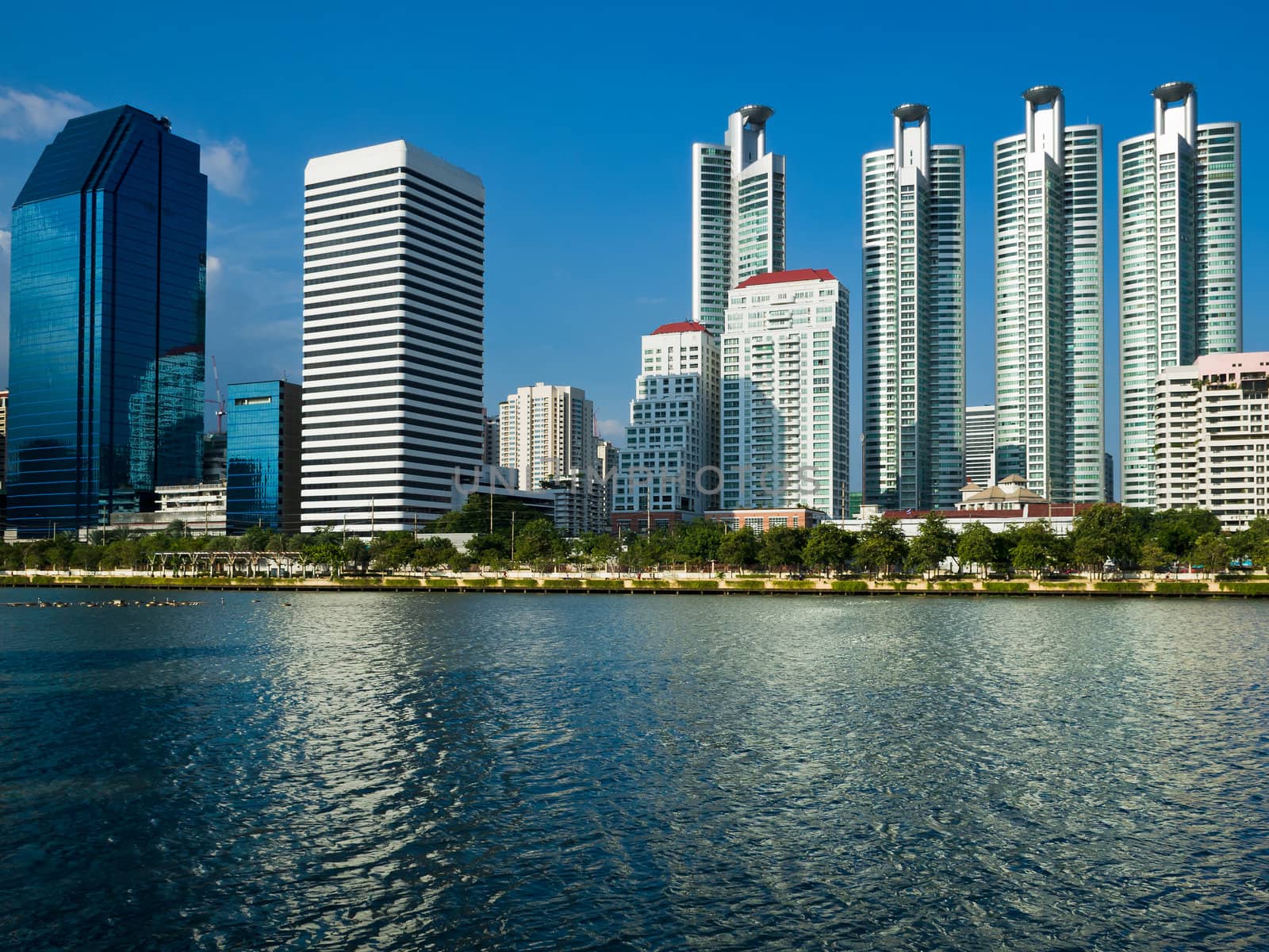 General Building and Blue sky and water by nuttakit