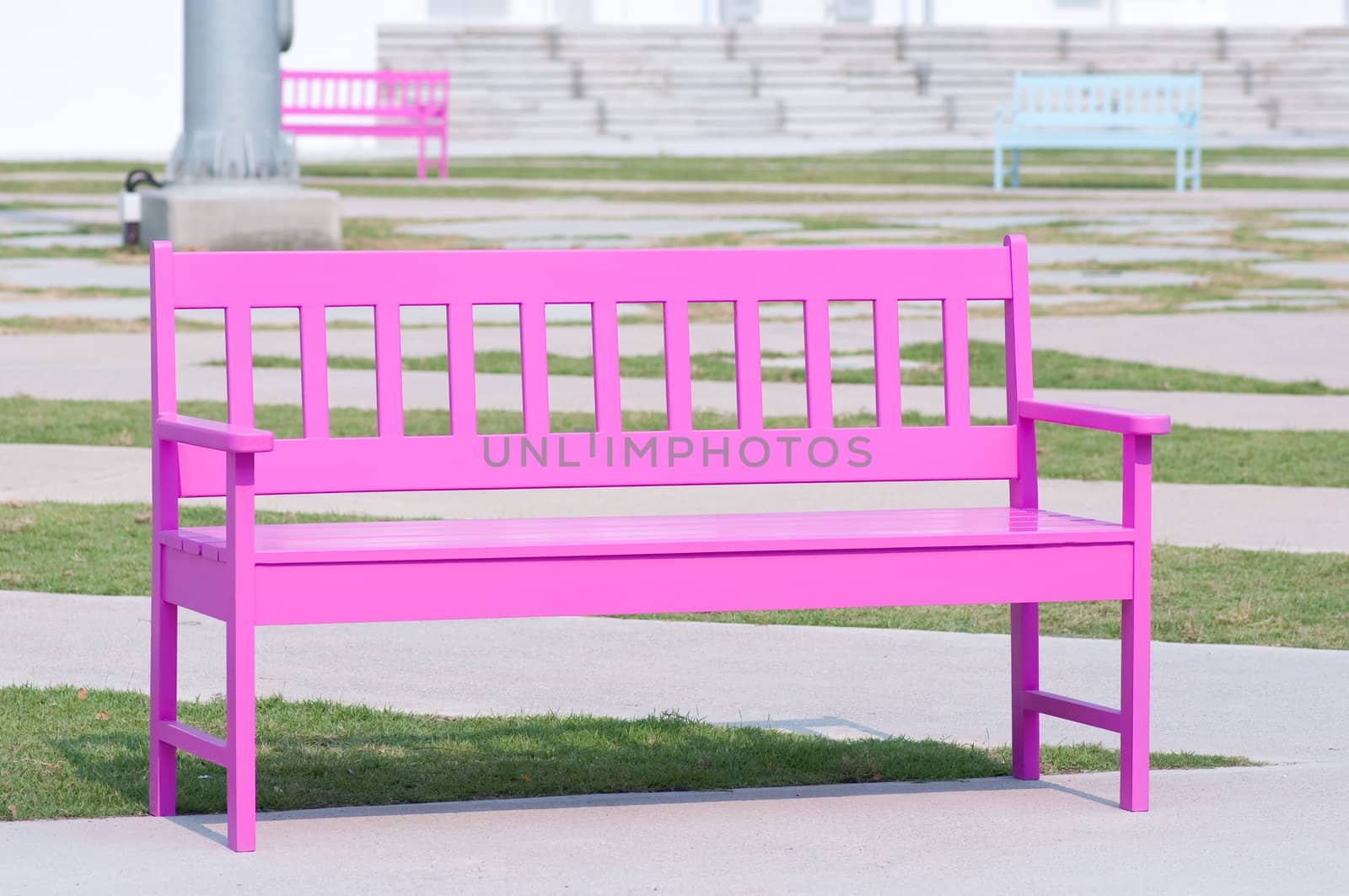 pink street chair in the park