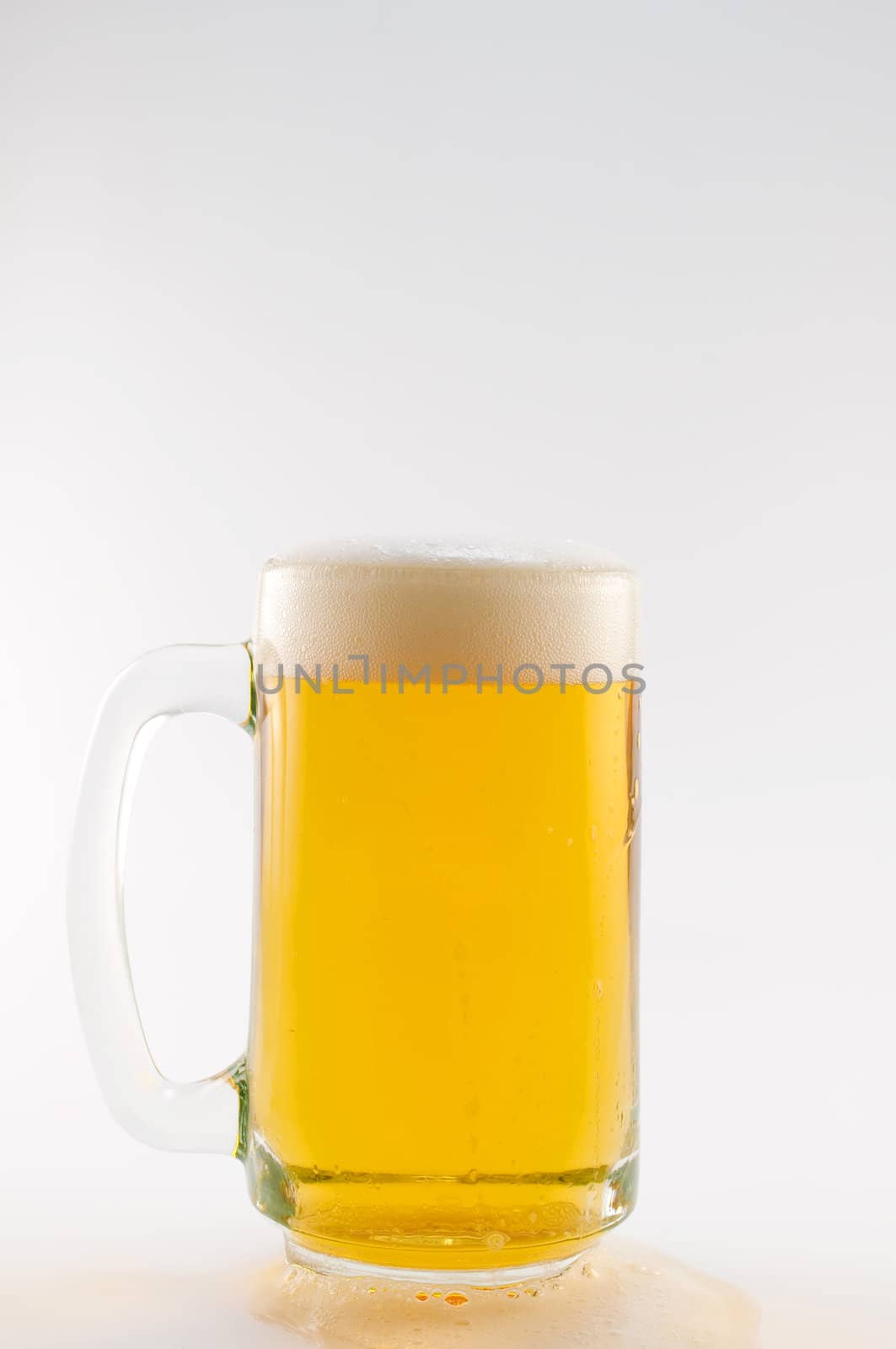 glass of beer on white background