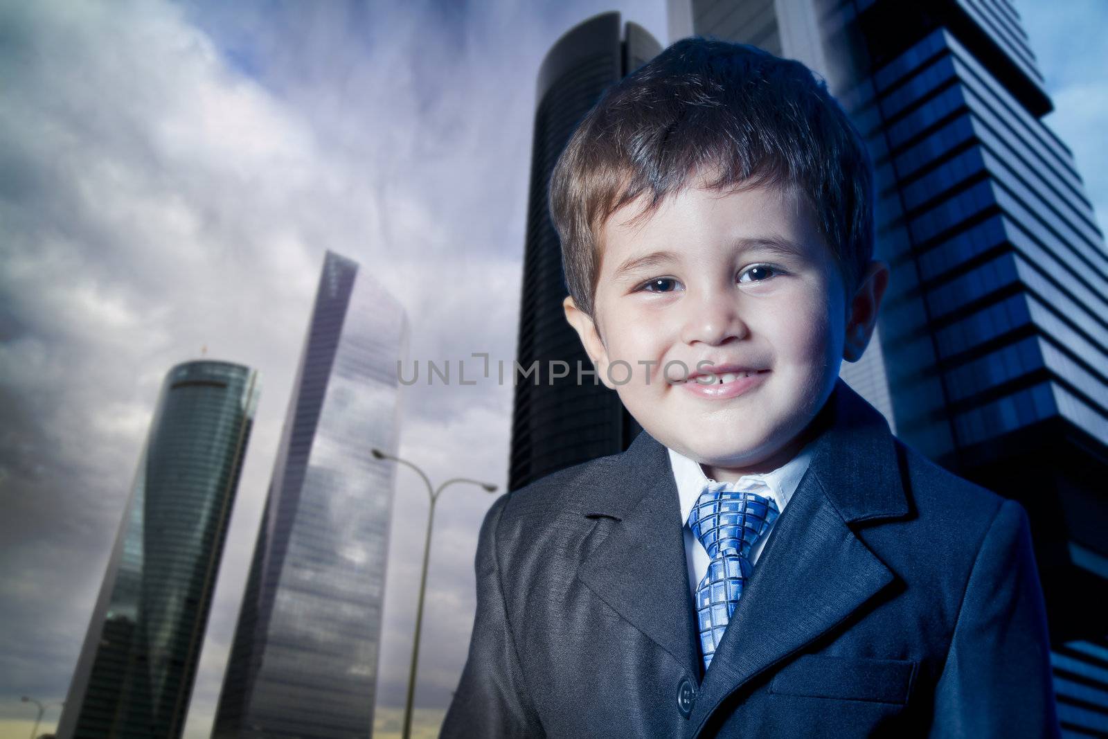 child dressed businessman smiling