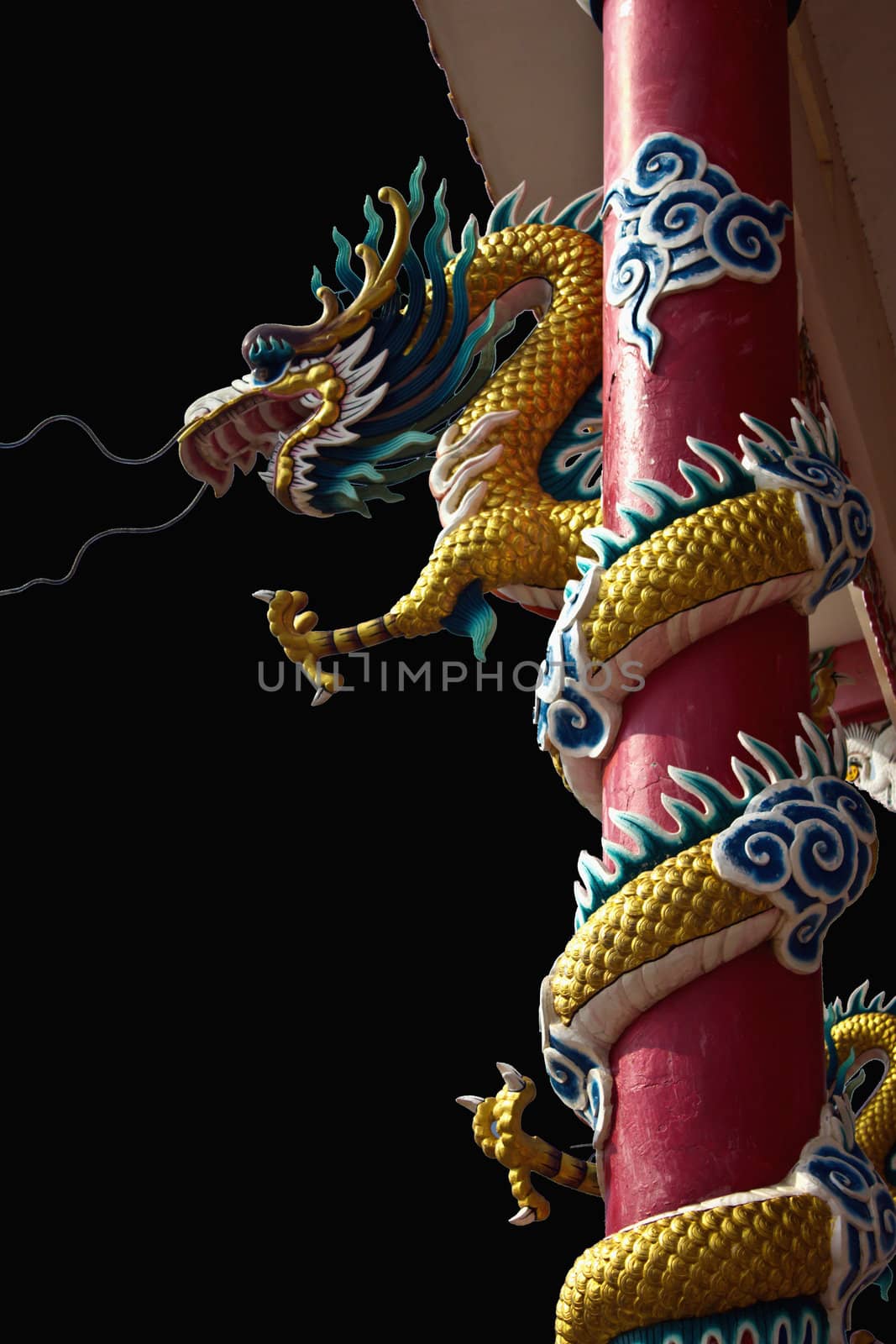 Golden Chinese Dragon Wrapped around red pole and bright sky   by singkamc