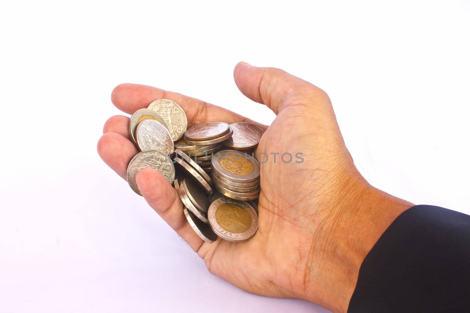 Stock Photo - A hand full of money and holding