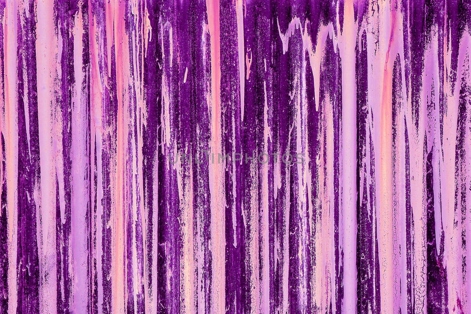 abstract red streaks on corrugated iron barricade