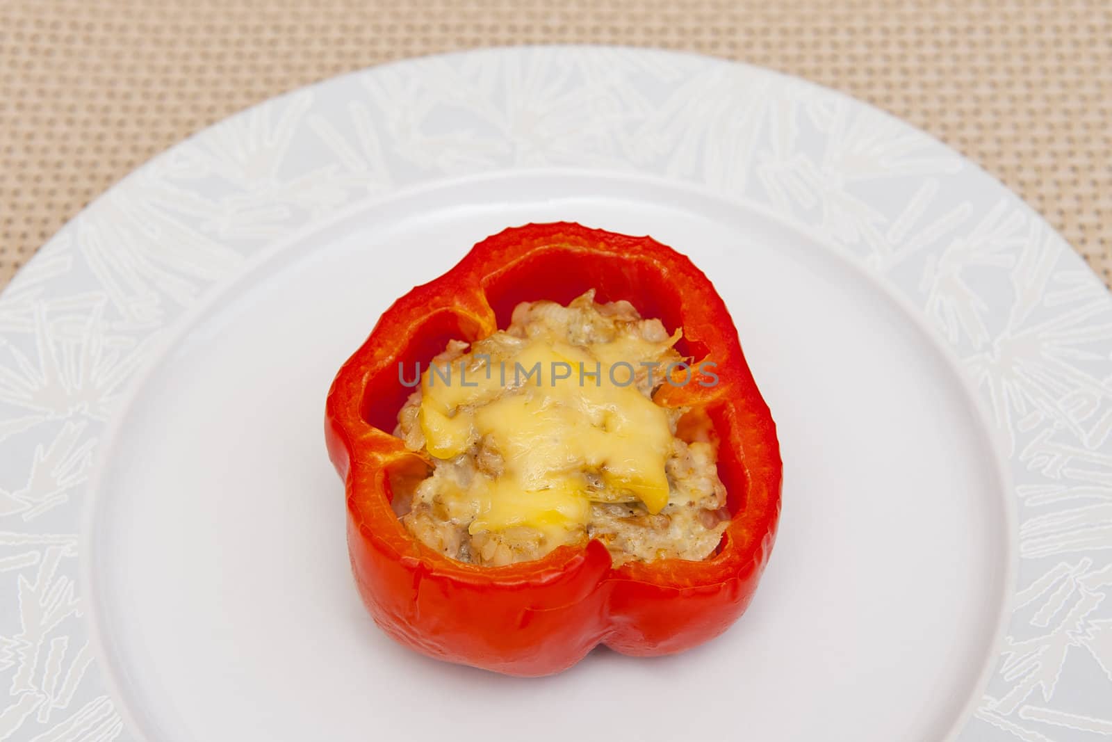 Stuffed pepper on the white plate